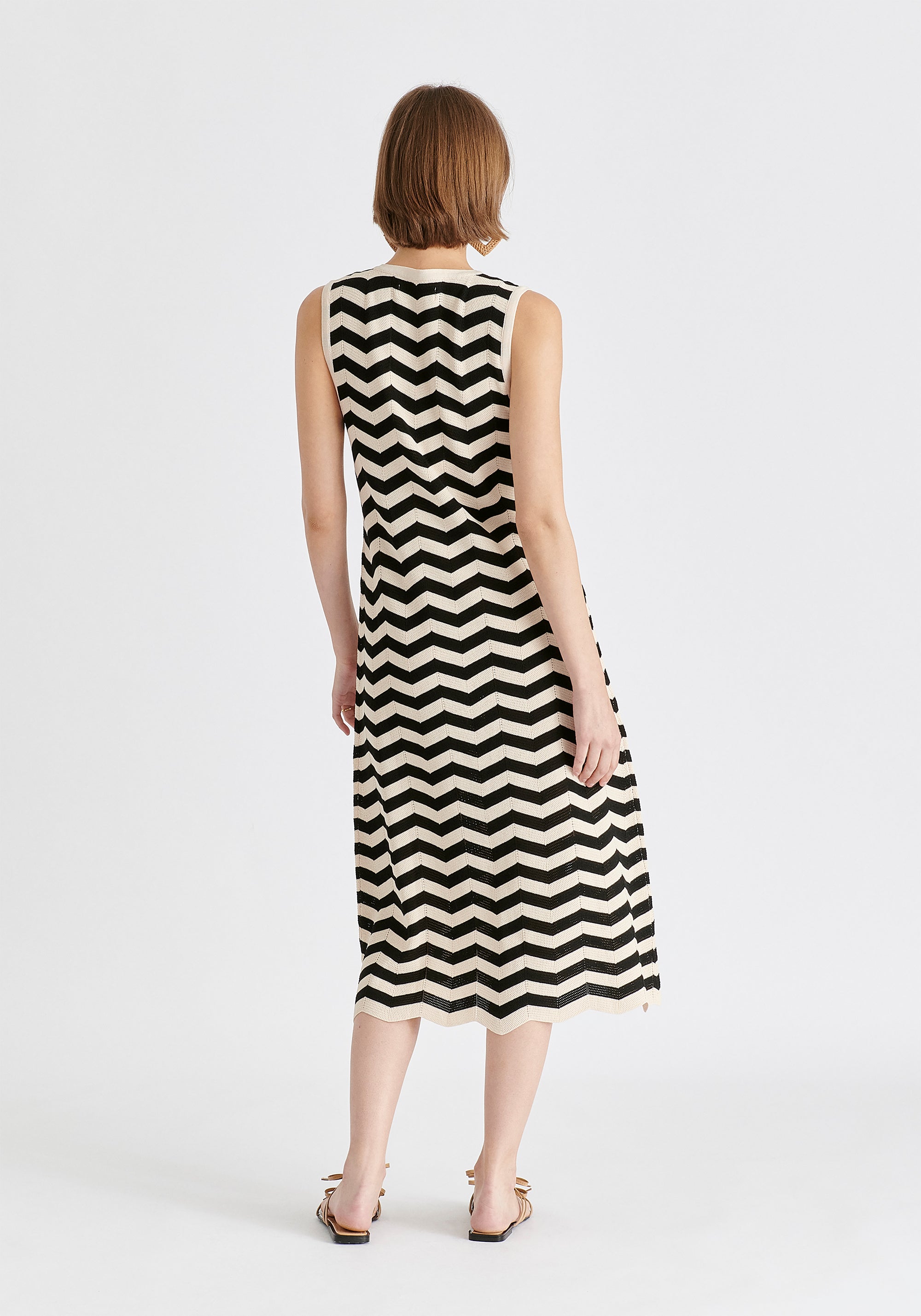 Sleeveless Midi Knit Dress in Zigzag Pattern in Black and Beige Back
