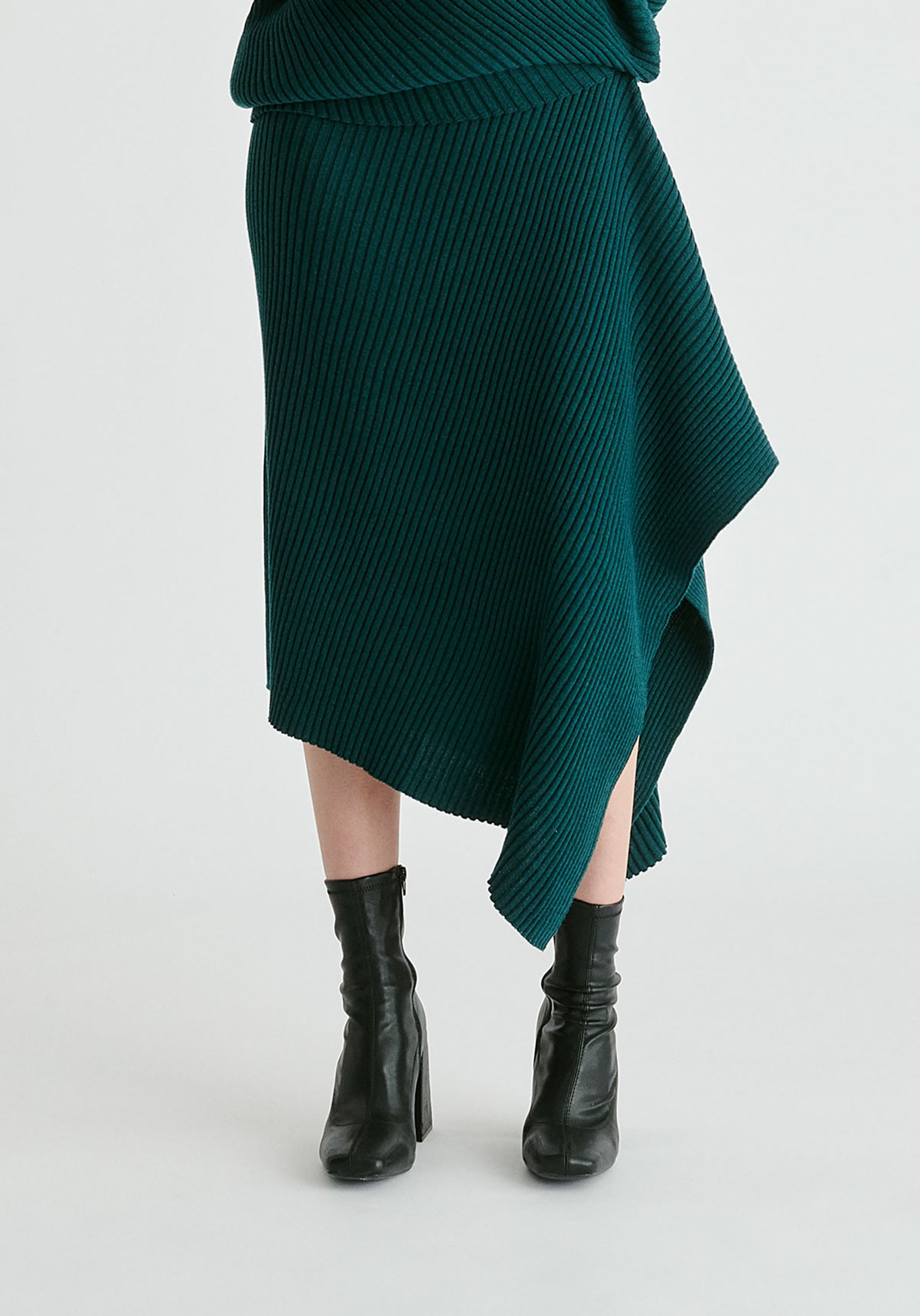 Draped Knitted Skirt in Dark Green Closeup