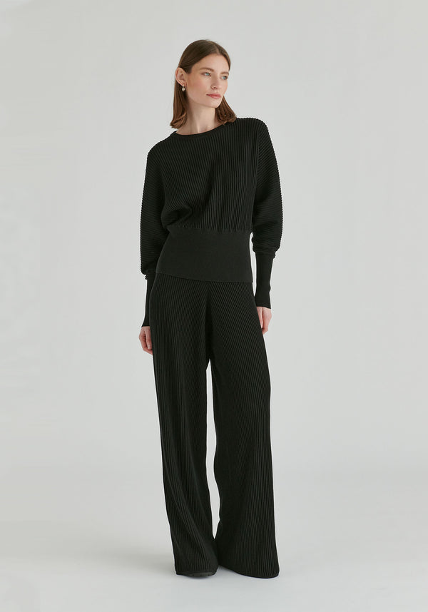 Ribbed Batwing Sleeve Knit Top with Fitted Waist in Black Front