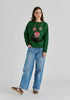 Christmas Jumper with Cat and Baubles in Green Front