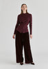 Wrap Front Knit Top with Mock Neck and Button Detail