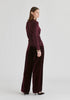 Wrap Front Knit Top with Mock Neck and Button Detail