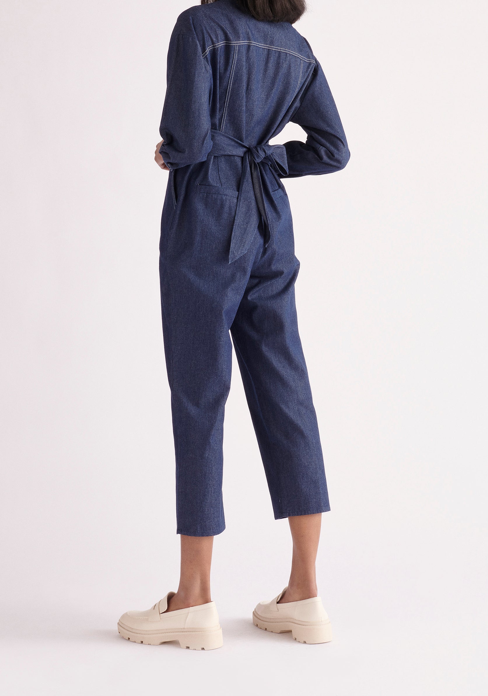 Paisie Waist Tie Denim Jumpsuit in Dark Blue Back