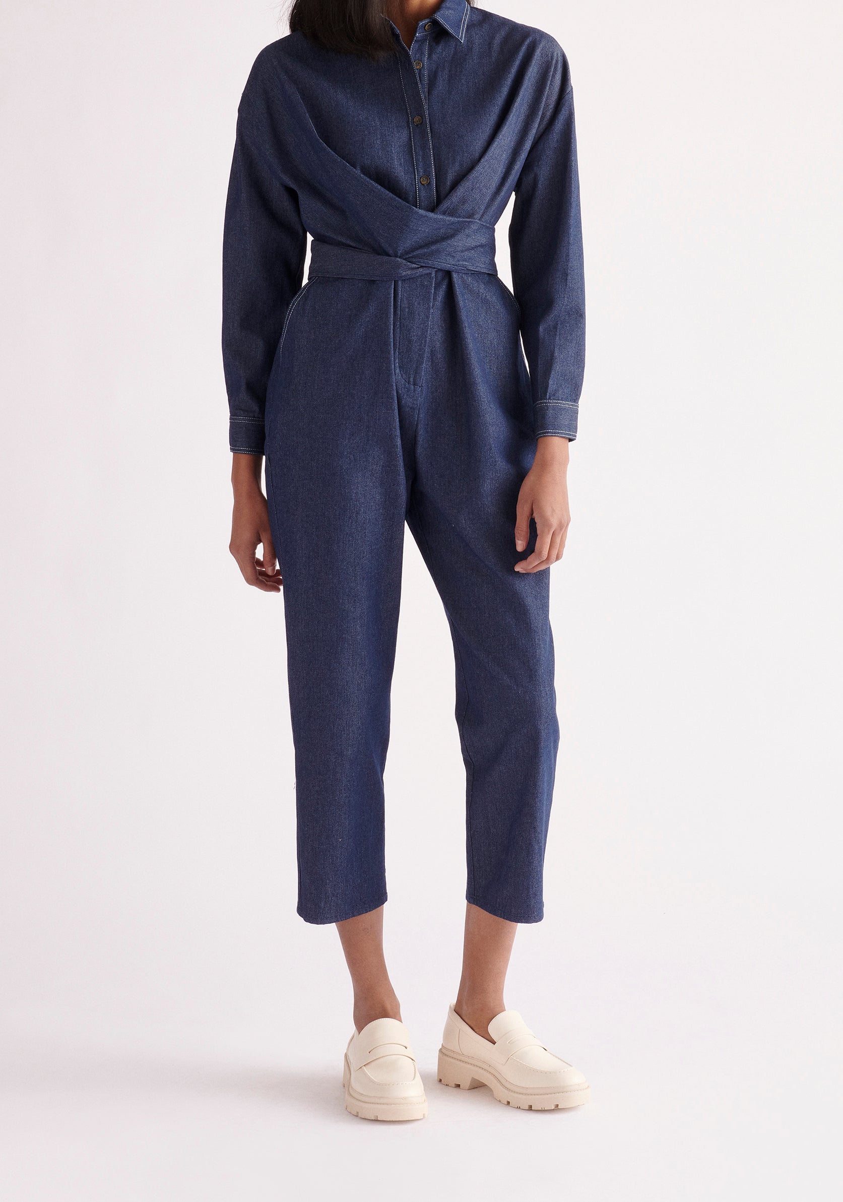 Paisie Waist Tie Denim Jumpsuit in Dark Blue