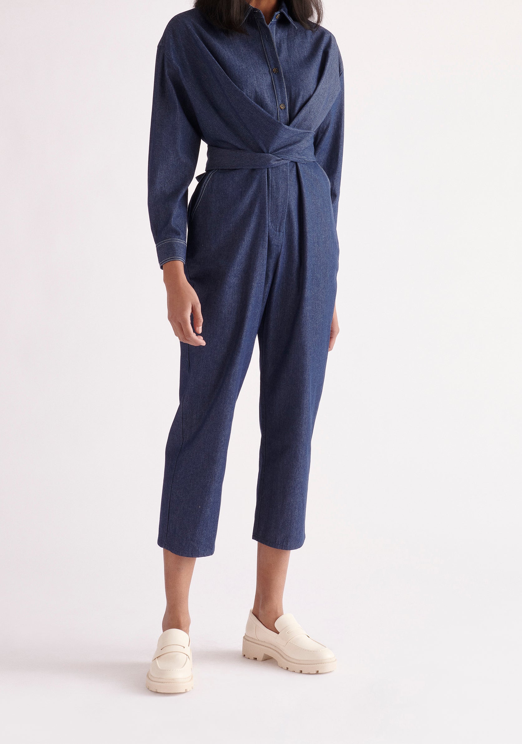 Paisie Waist Tie Denim Jumpsuit in Dark Blue