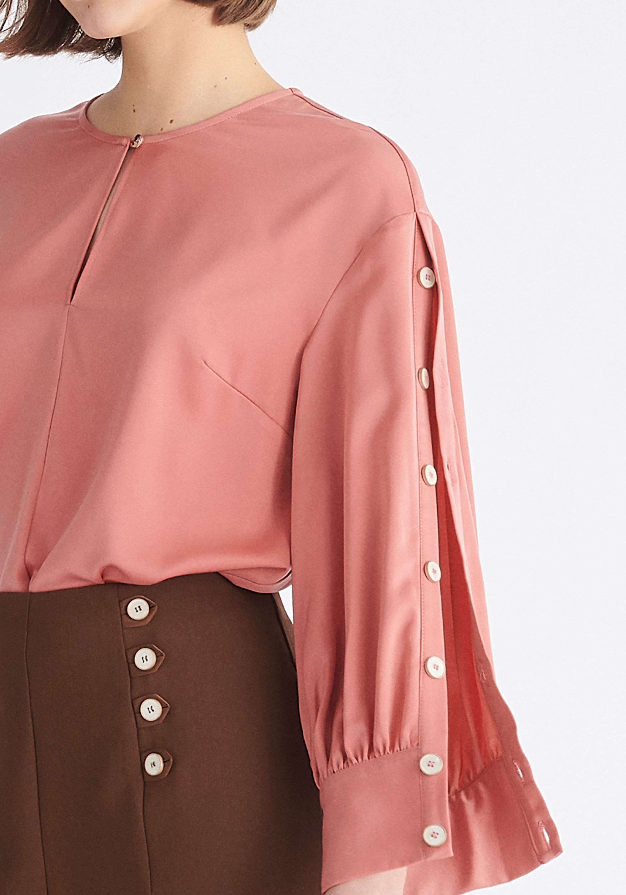 Paisie Button Sleeve Blouse in Coral Pink Close Up