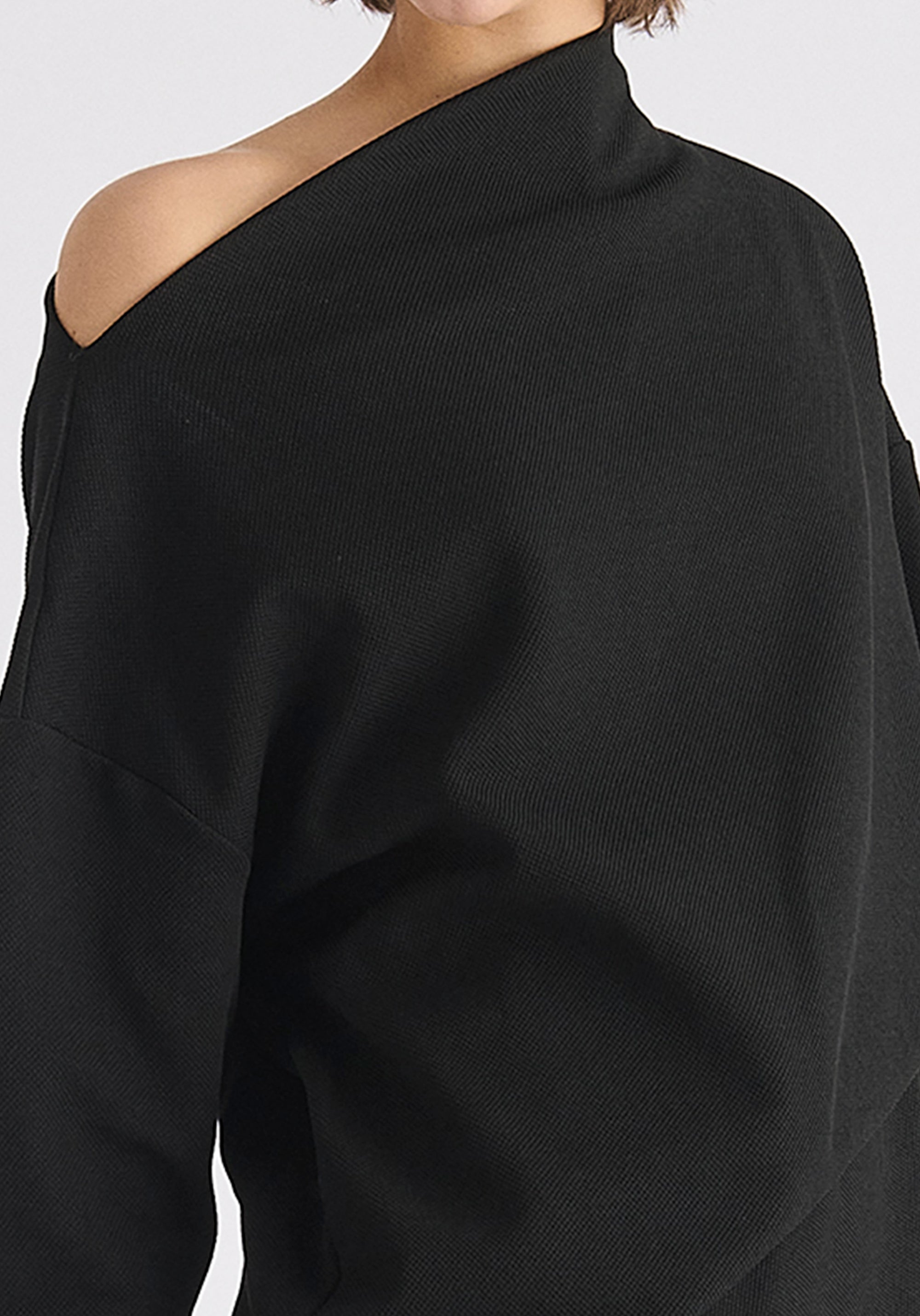 Asymmetric Neck Jumper Dress in Black Close Up