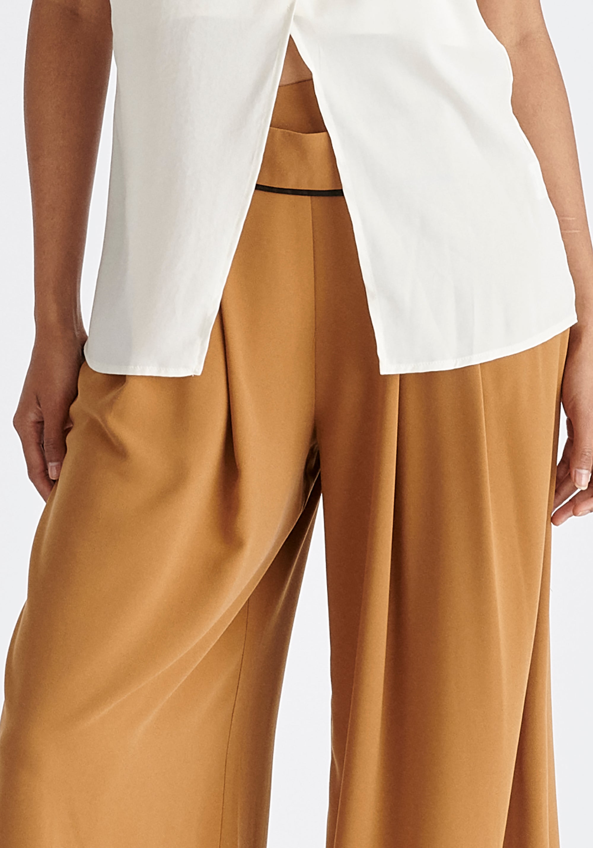 Asymmetric Waistband Trousers in Brown and Black Close Up