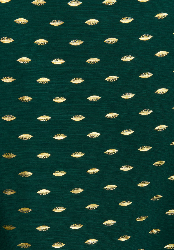 Gold Foil Print Cut-Out Draped Sleeve Top in Dark Green and Gold Close Up