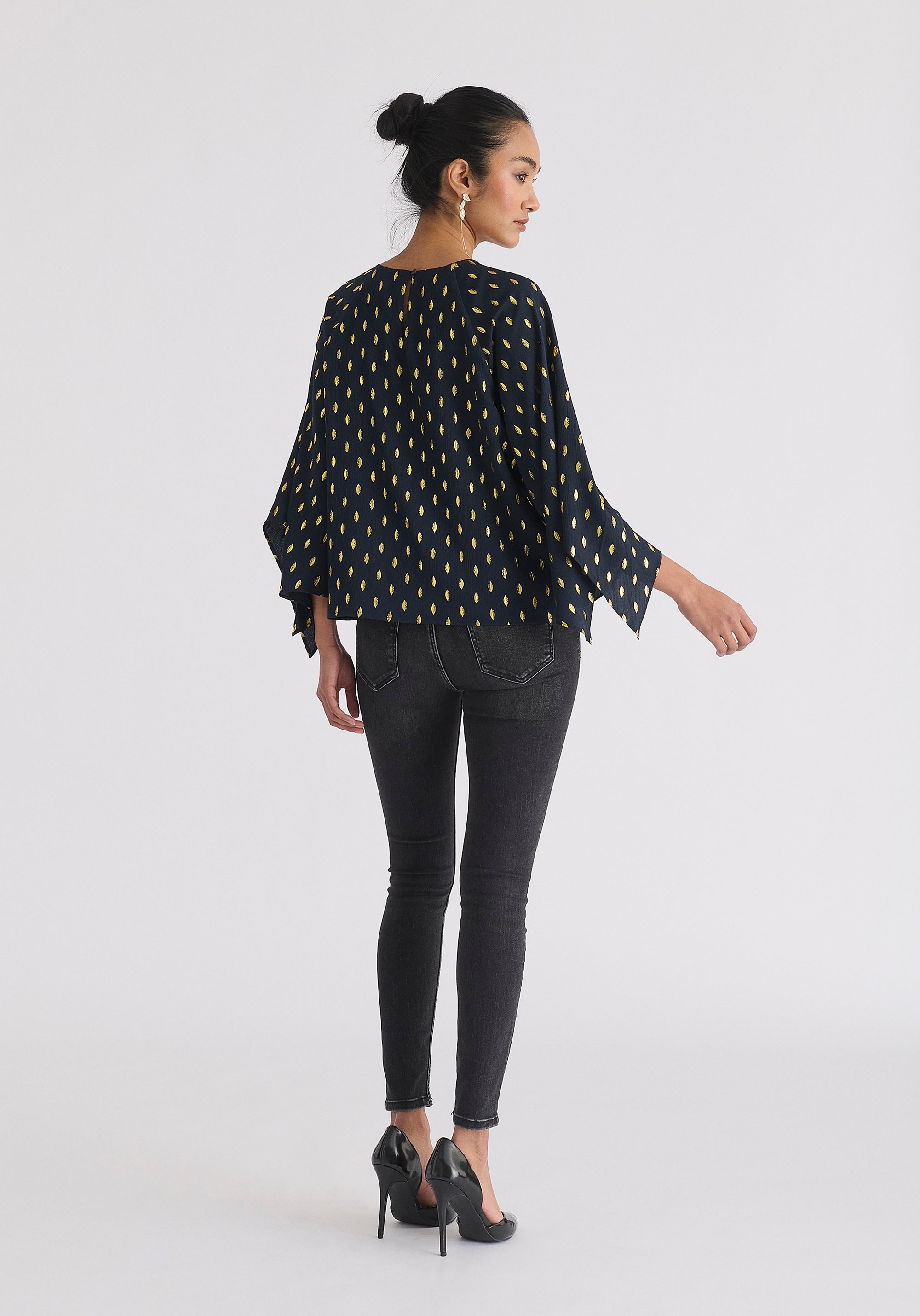 Gold Foil Print Cut-Out Draped Sleeve Top in Navy and Gold Back