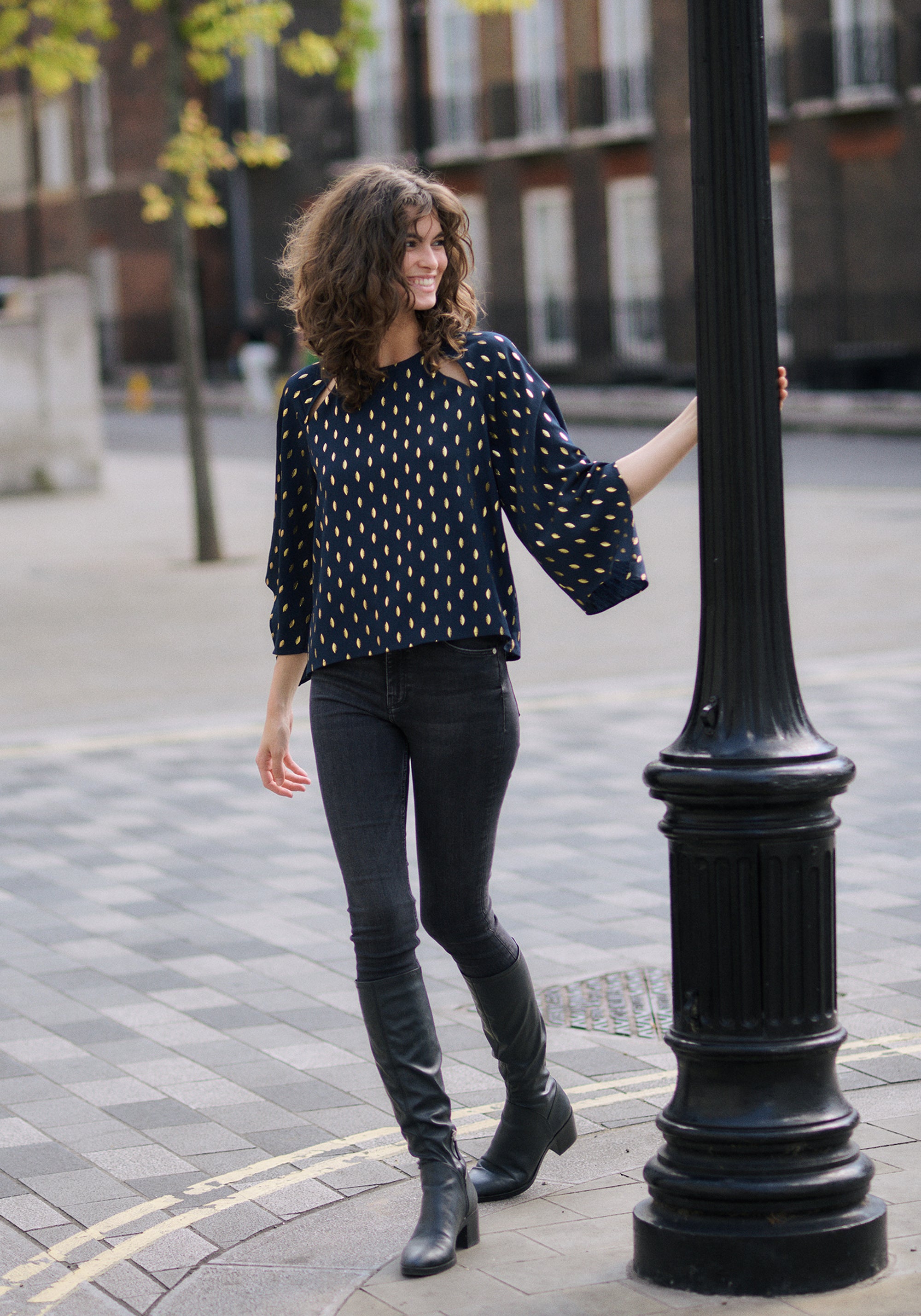 Gold Foil Print Cut-Out Draped Sleeve Top in Navy and Gold Front