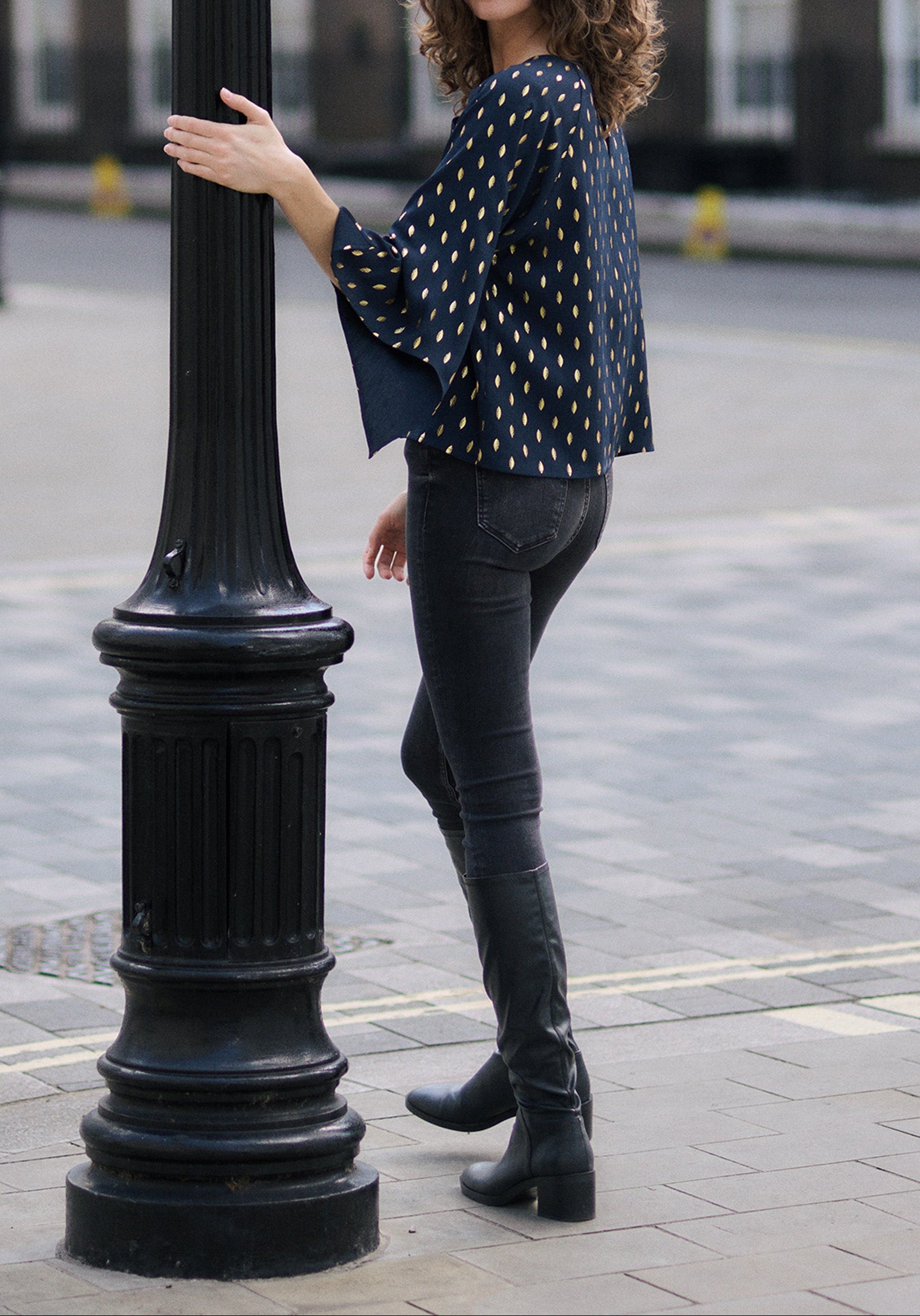 Gold Foil Print Cut-Out Draped Sleeve Top in Navy and Gold Back