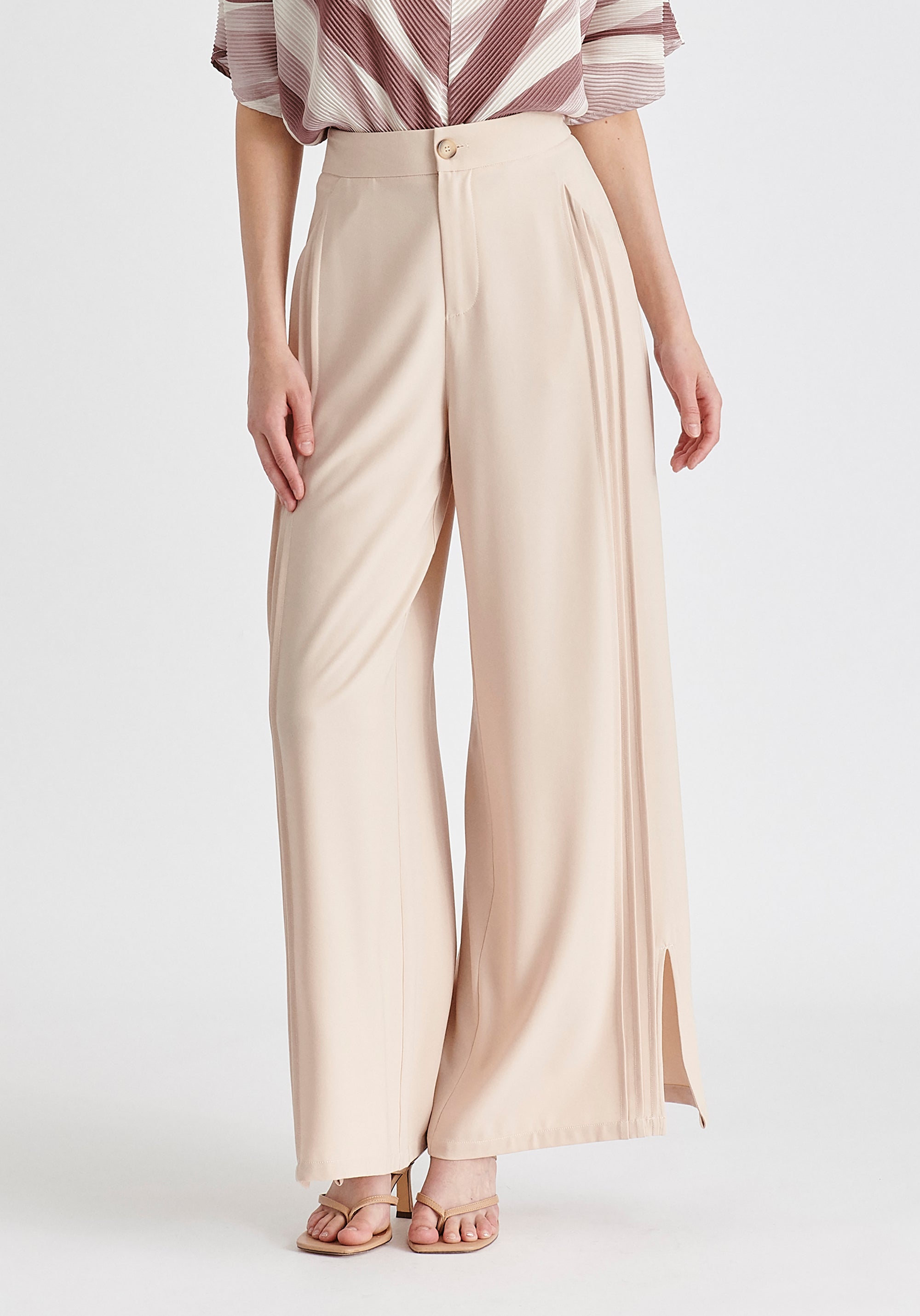 Wide Leg Trousers with Side Pleats and Split Hem In Taupe