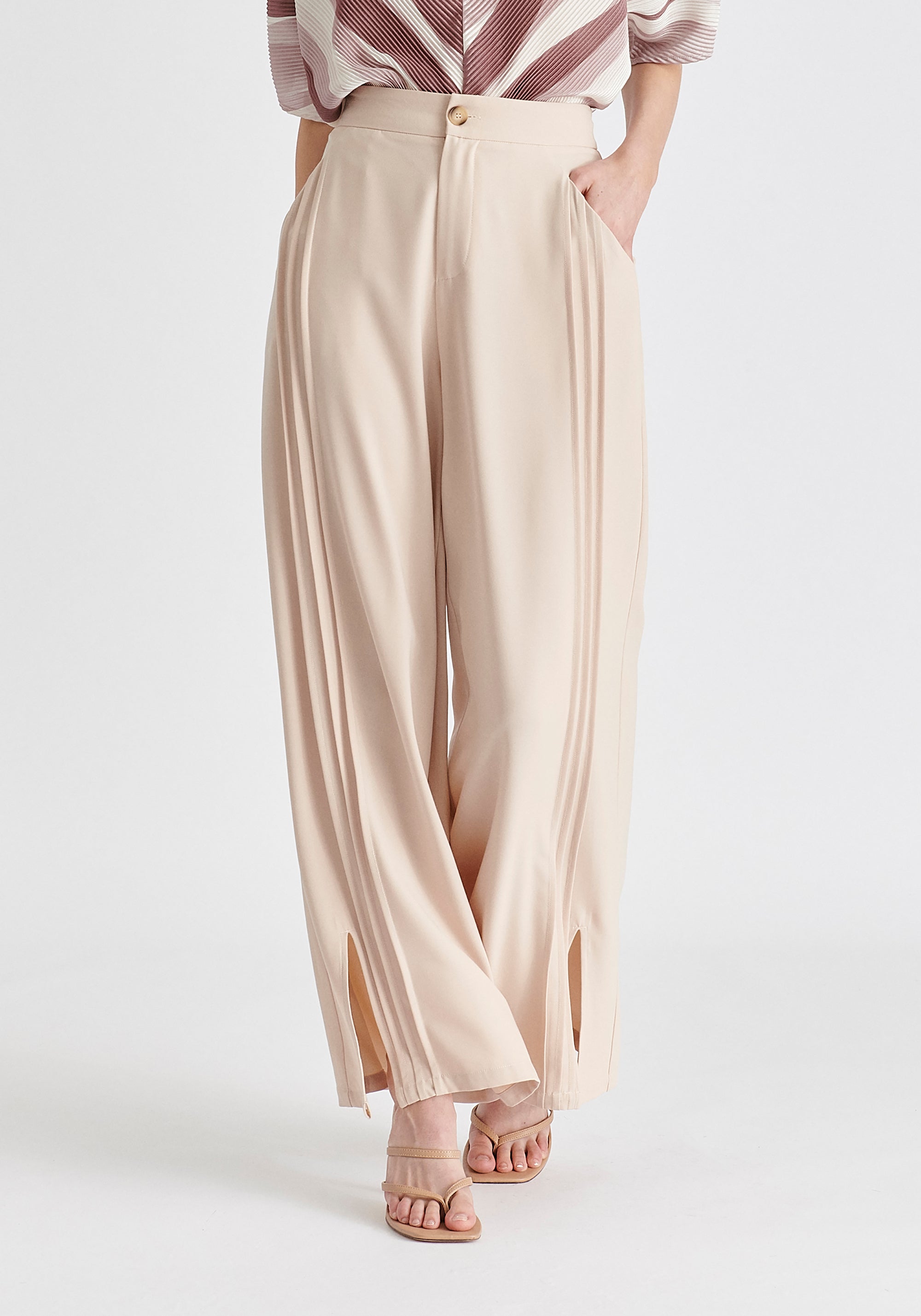 Wide Leg Trousers with Side Pleats and Split Hem In Taupe Front