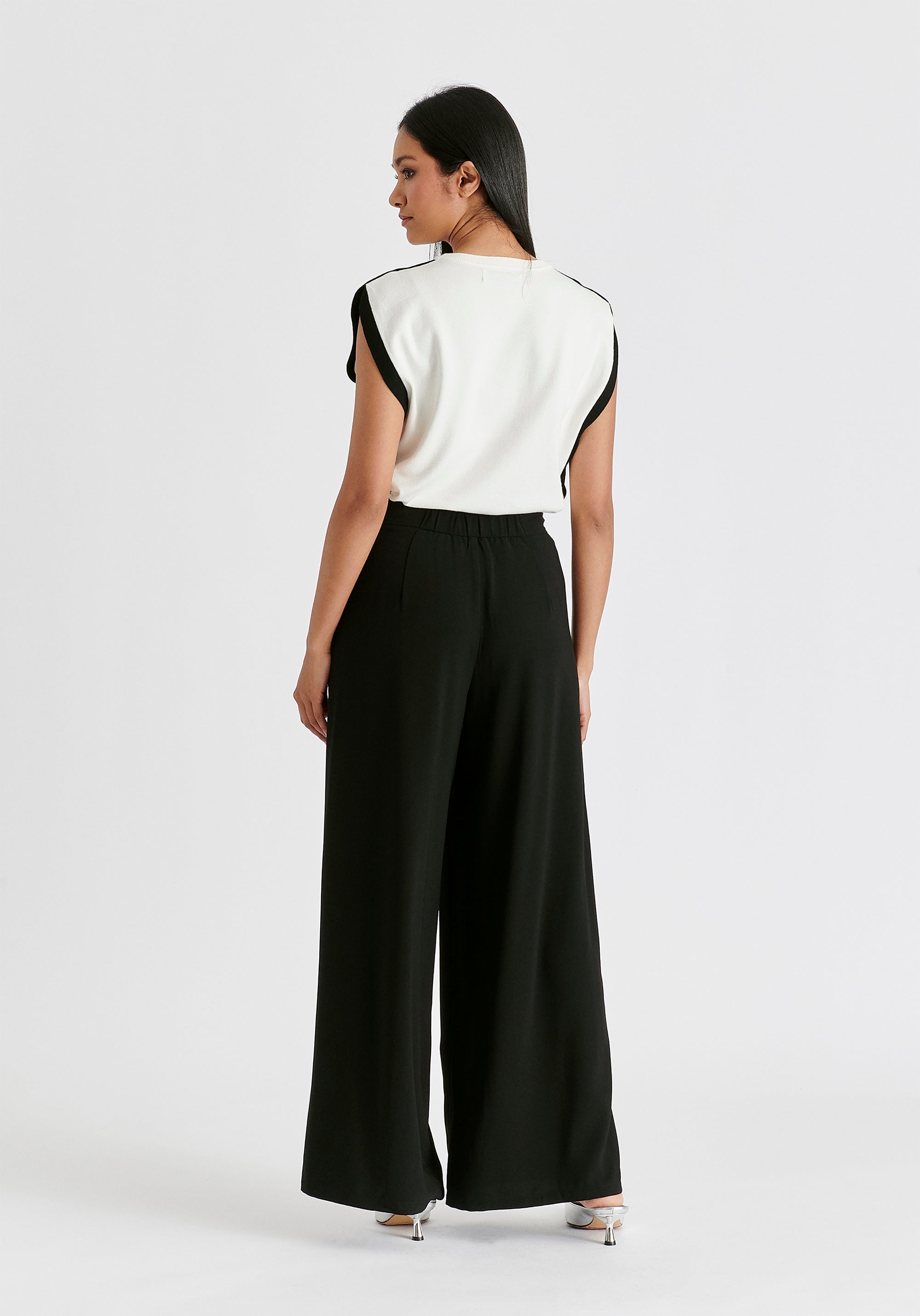 Wide Leg Trousers with Side Pleats and Split Hem In Black Back