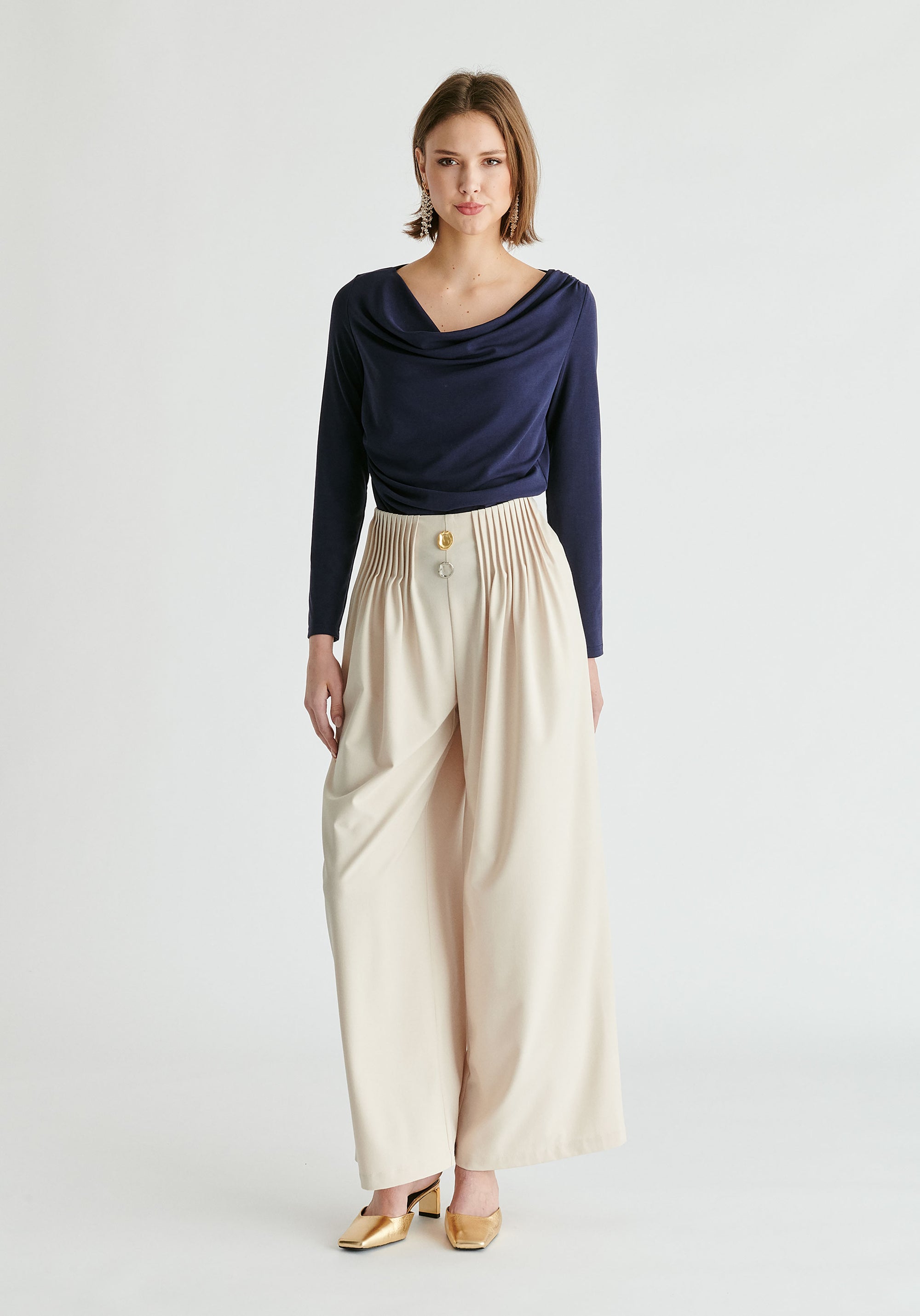 Wide Leg Trousers with Pleated Waist Detail in Cream Front