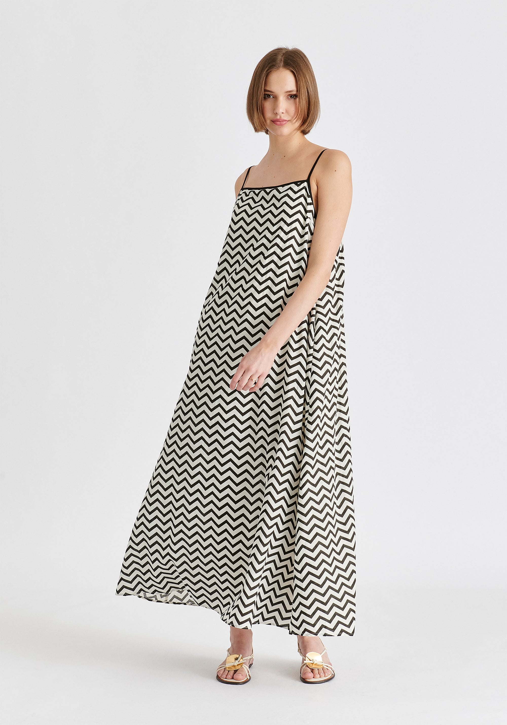 Spaghetti Strap Swing Dress in Zigzag Pattern in White and Black Front