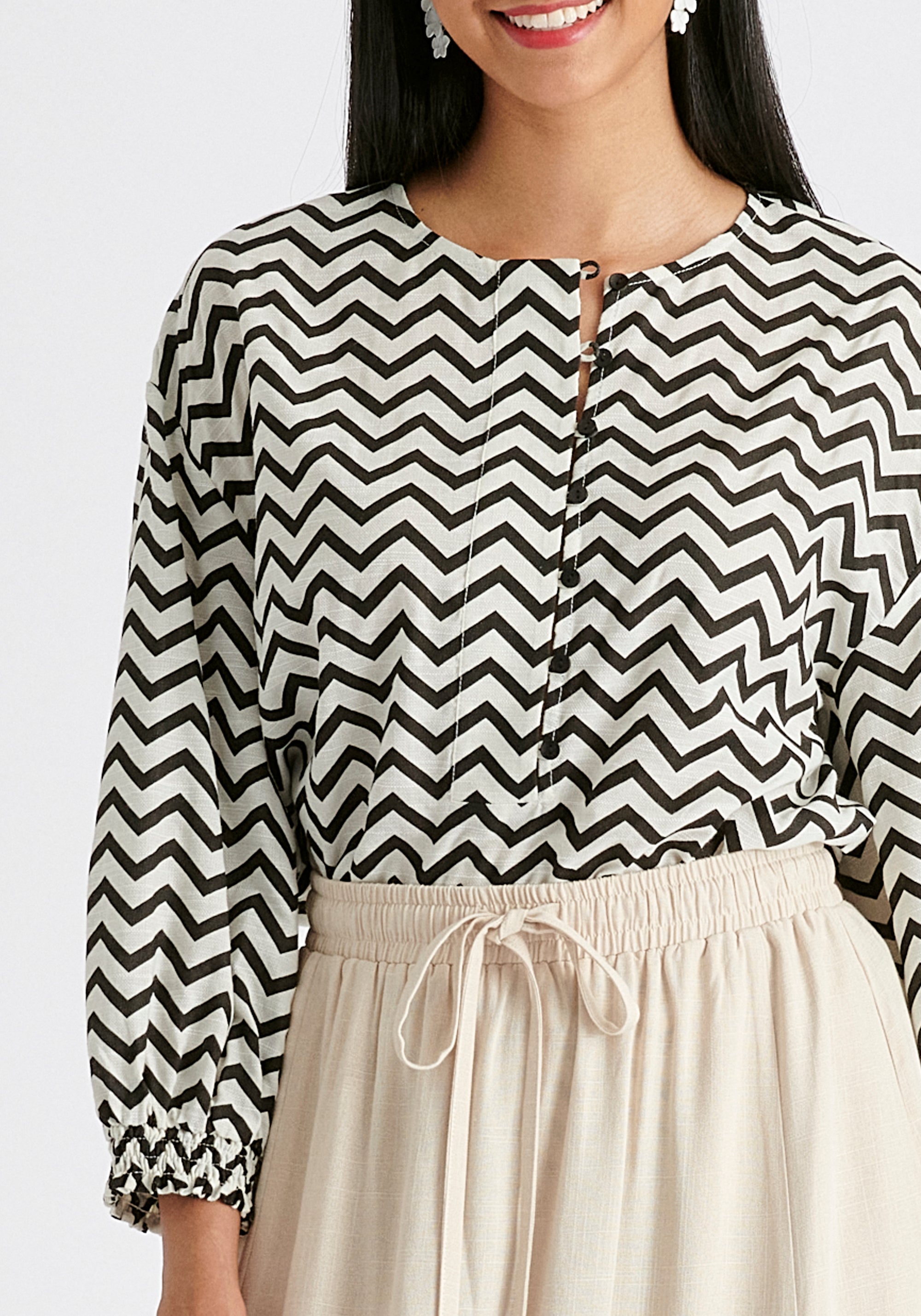 Buttoned Mid Sleeve Top in Zigzag Pattern in White and Black Closeup