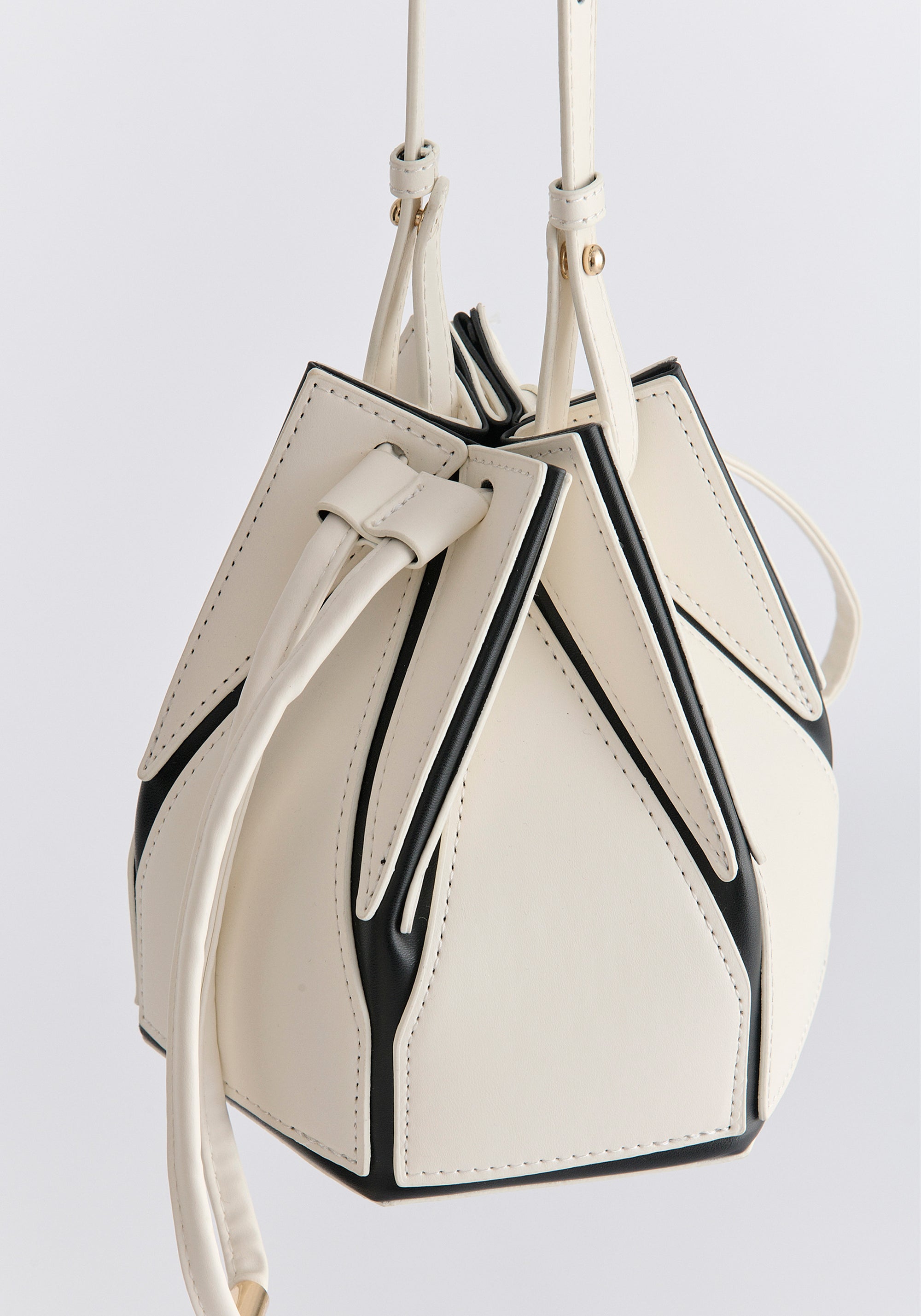 Hexagon Drawstring Bucket Bag in White and Black Close Up