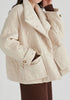 Double Breasted Diamond Quilted Utility Jacket Drawstring Waist in Cream Close up