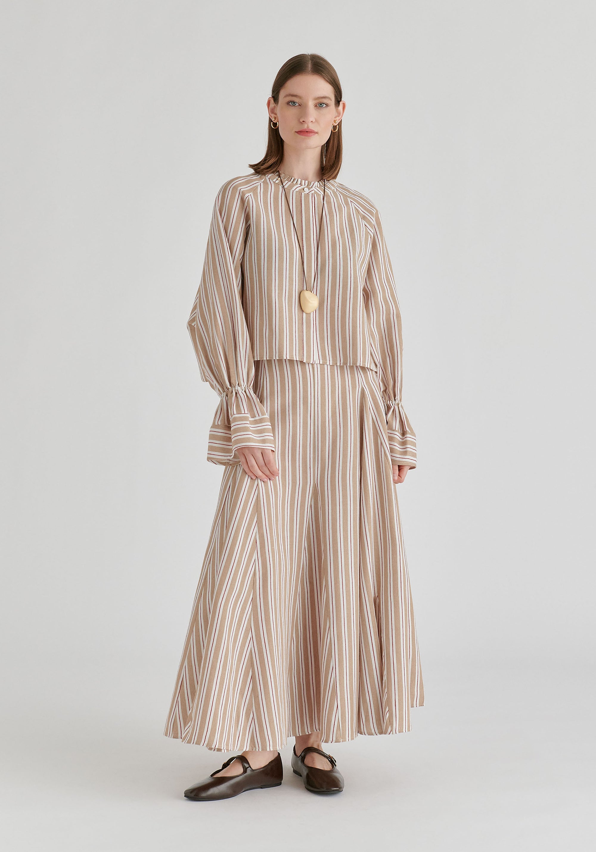 Ruffle Round Neck Blouse with Cinch Wrist Detail in Stripes