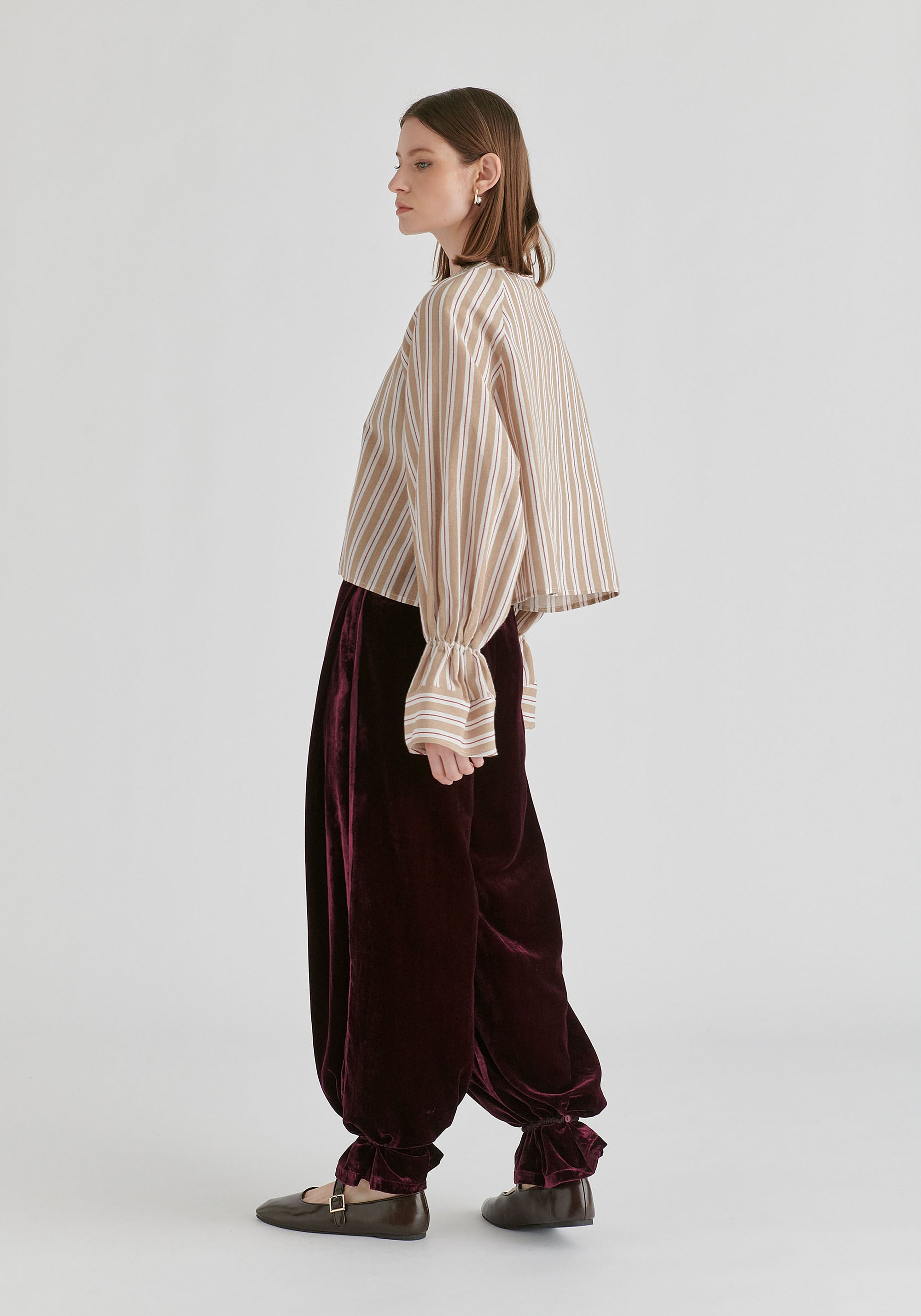 Ruffle Round Neck Blouse with Cinch Wrist Detail in Stripes