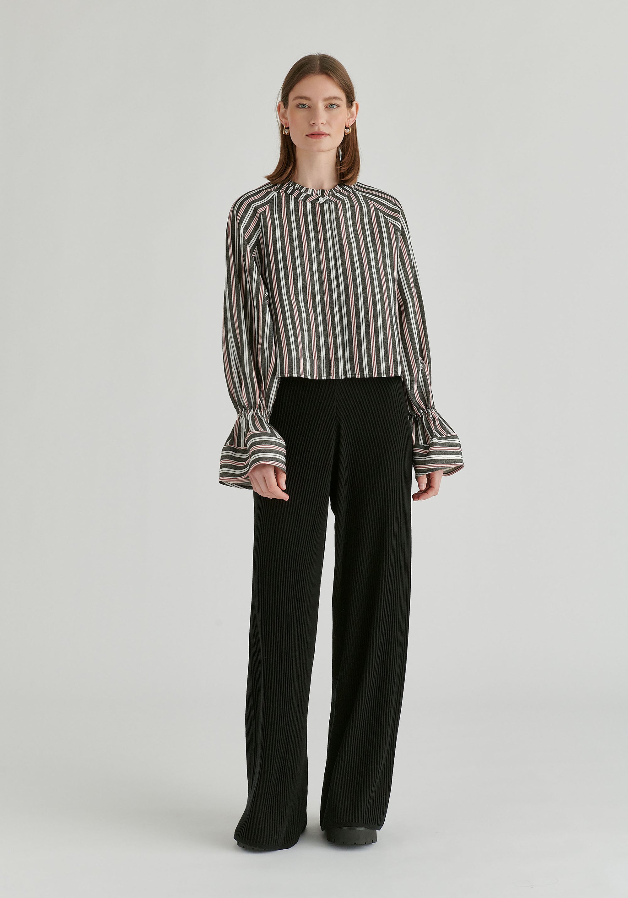 Ruffle Round Neck Blouse with Cinch Wrist Detail in Black Stripes Front