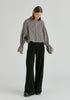 Ruffle Round Neck Blouse with Cinch Wrist Detail in Black Stripes Front