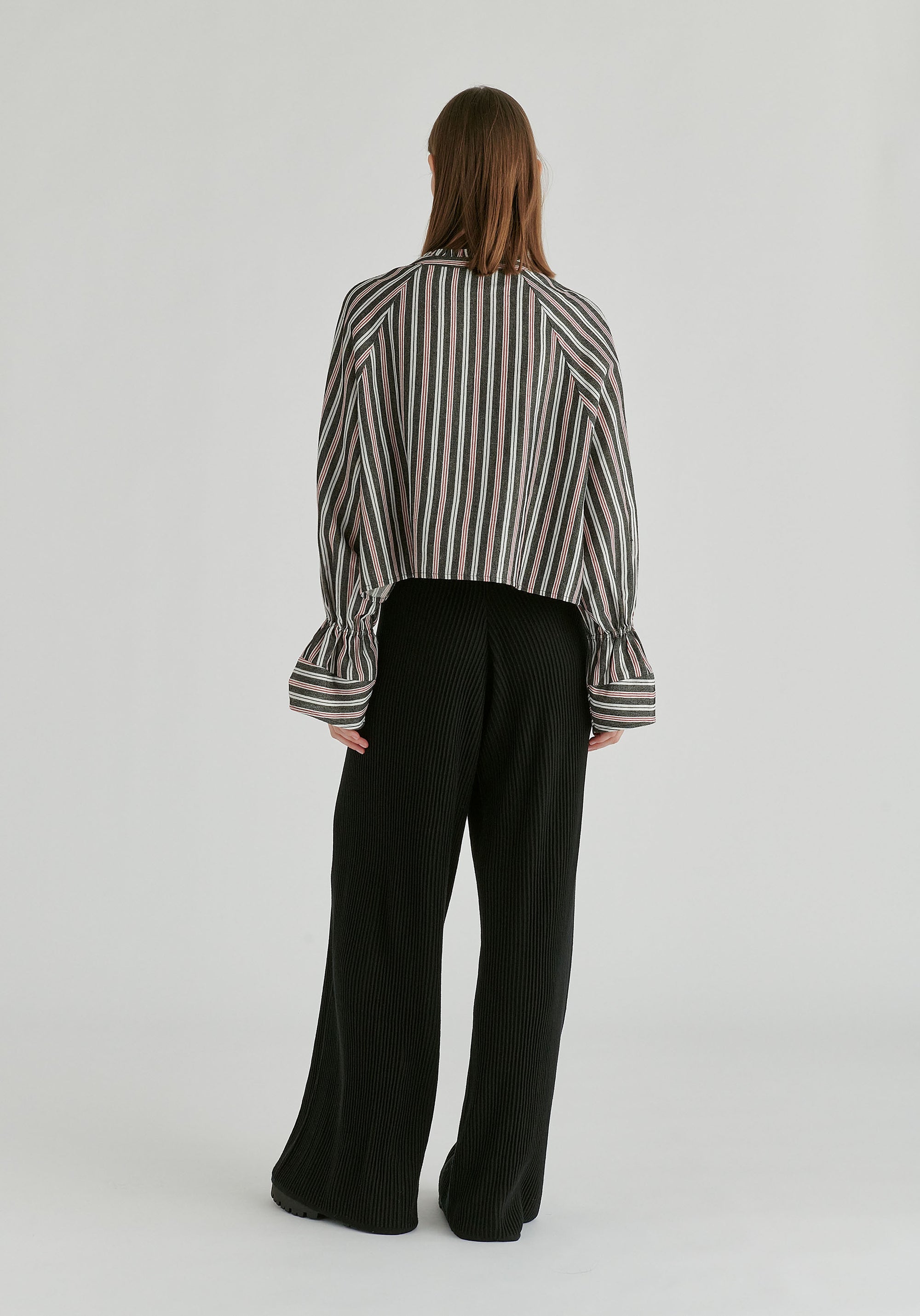 Ruffle Round Neck Blouse with Cinch Wrist Detail in Black Stripes Back