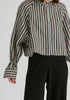 Ruffle Round Neck Blouse with Cinch Wrist Detail in Black Stripes Closeup