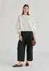 Ruffle Round Neck Blouse with Cinch Wrist Detail in White Front