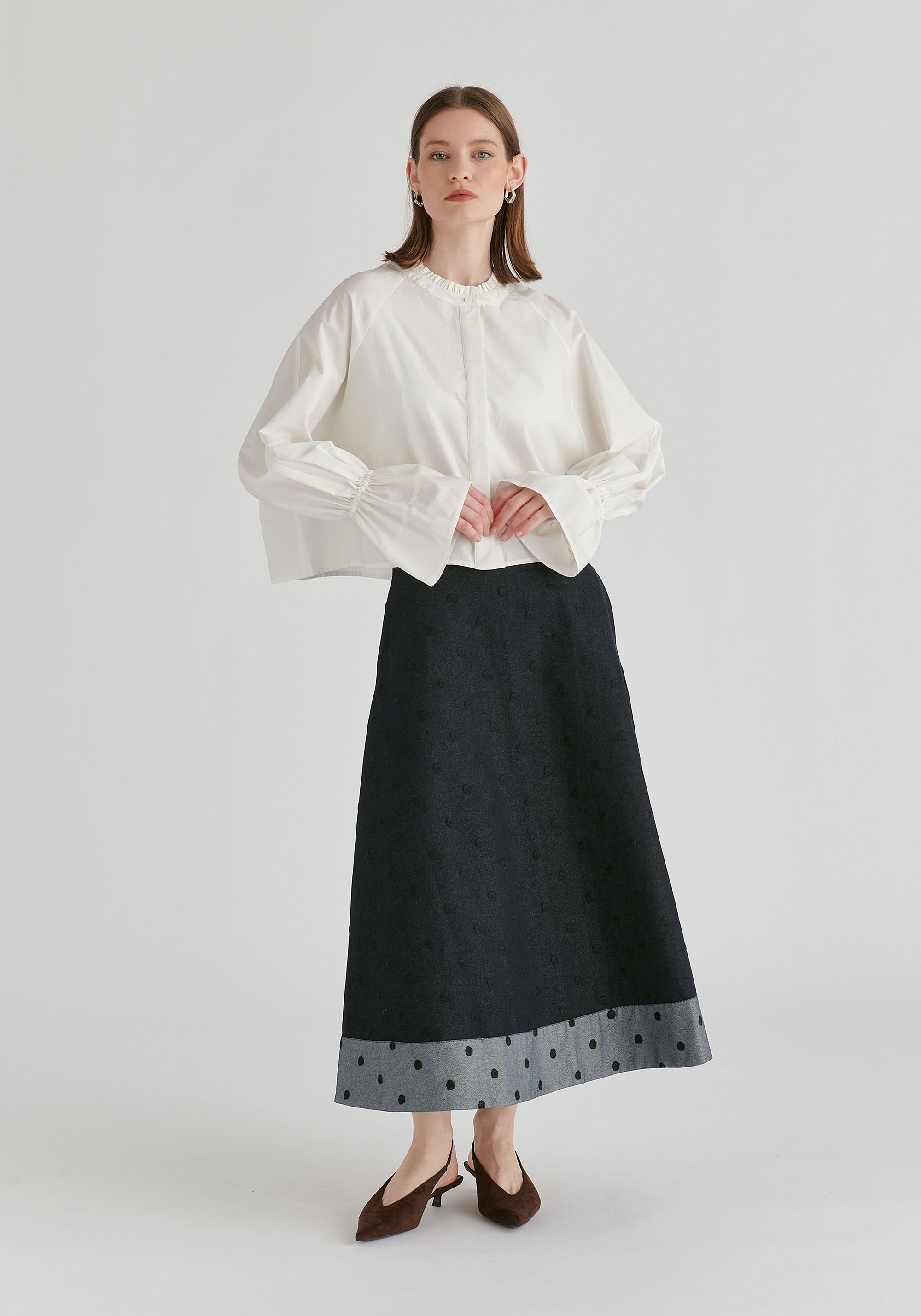 Ruffle Round Neck Blouse with Cinch Wrist Detail in White Front
