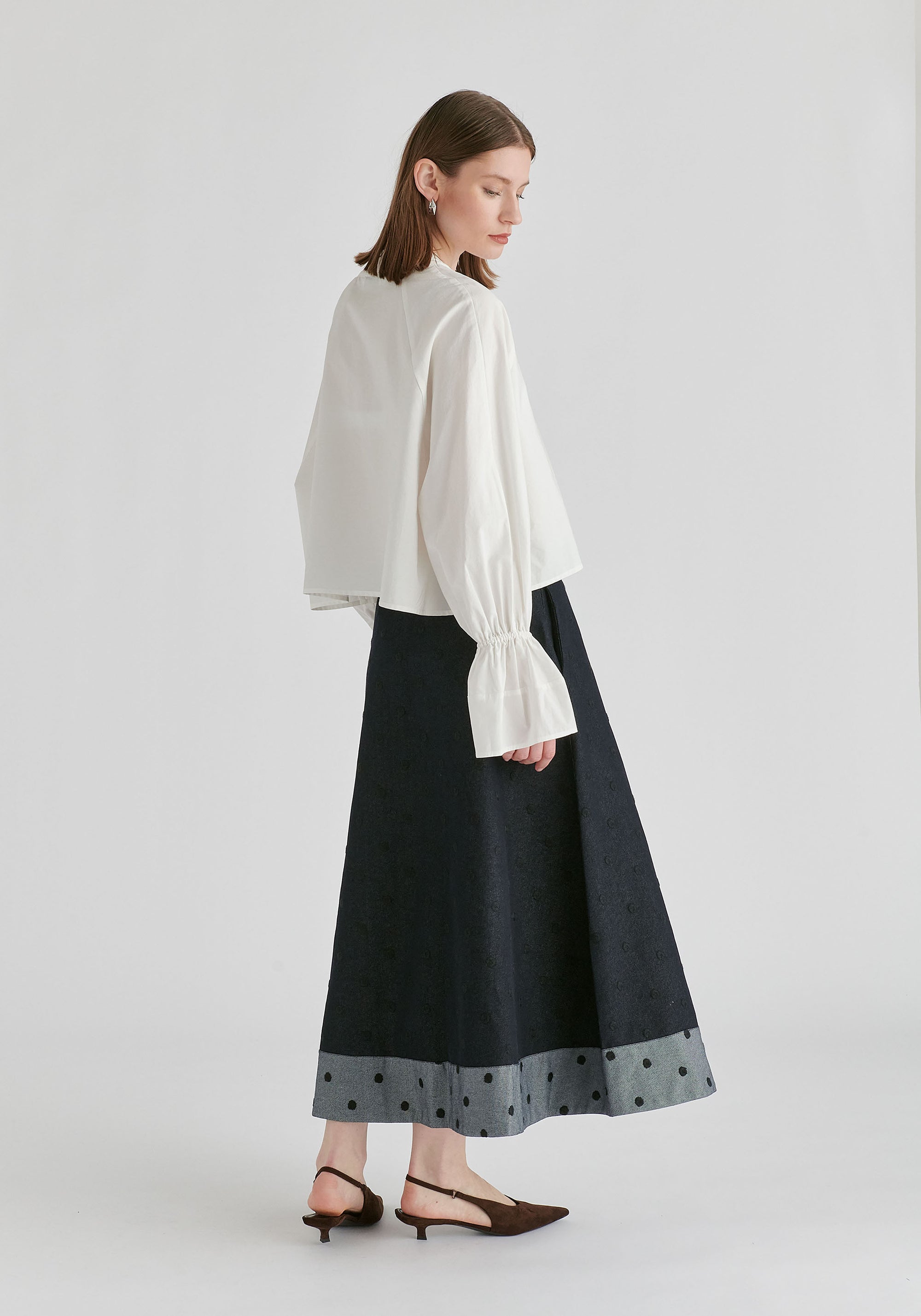 Ruffle Round Neck Blouse with Cinch Wrist Detail in White Back