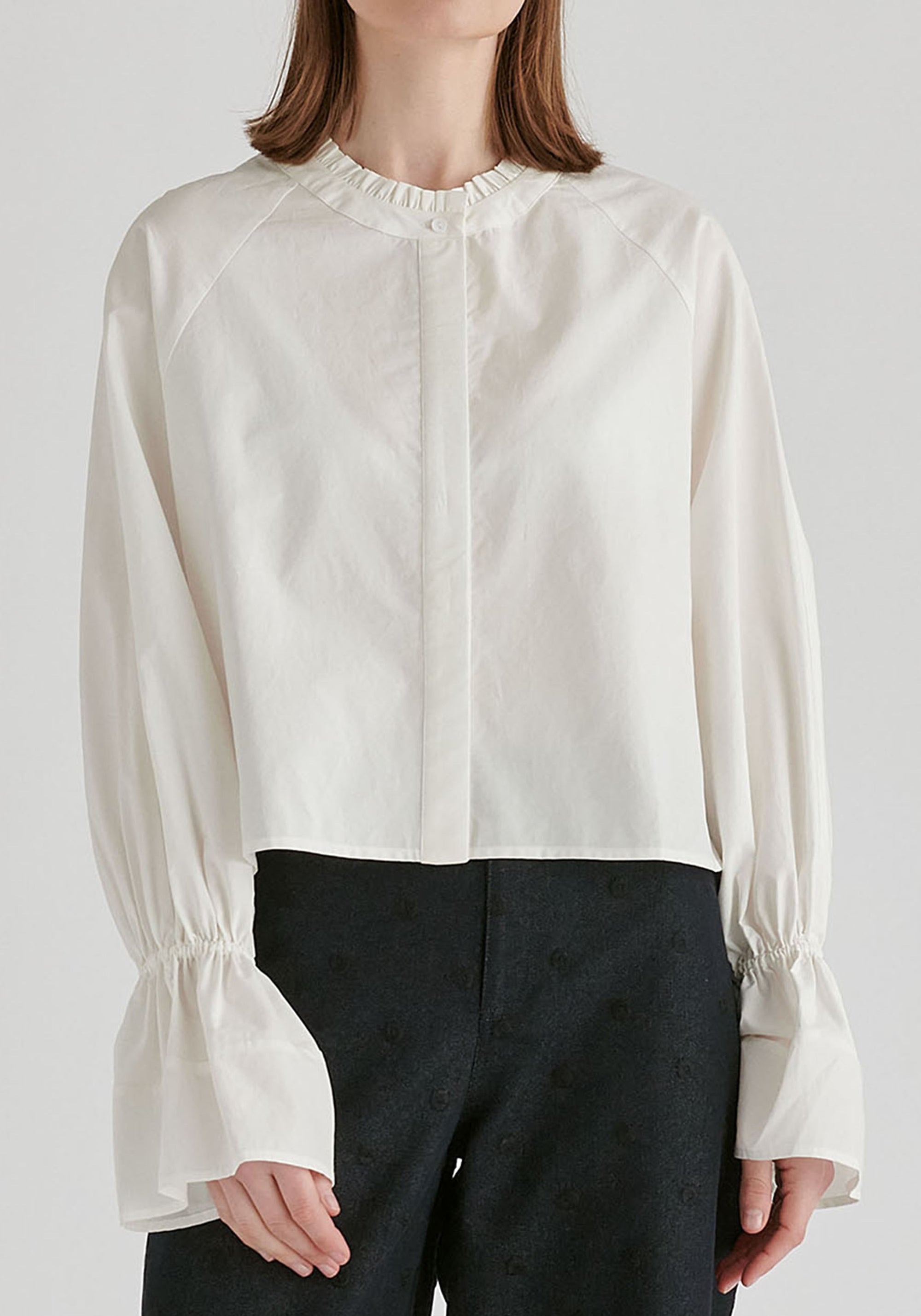 Ruffle Round Neck Blouse with Cinch Wrist Detail in White Closeup