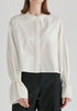 Ruffle Round Neck Blouse with Cinch Wrist Detail in White Closeup