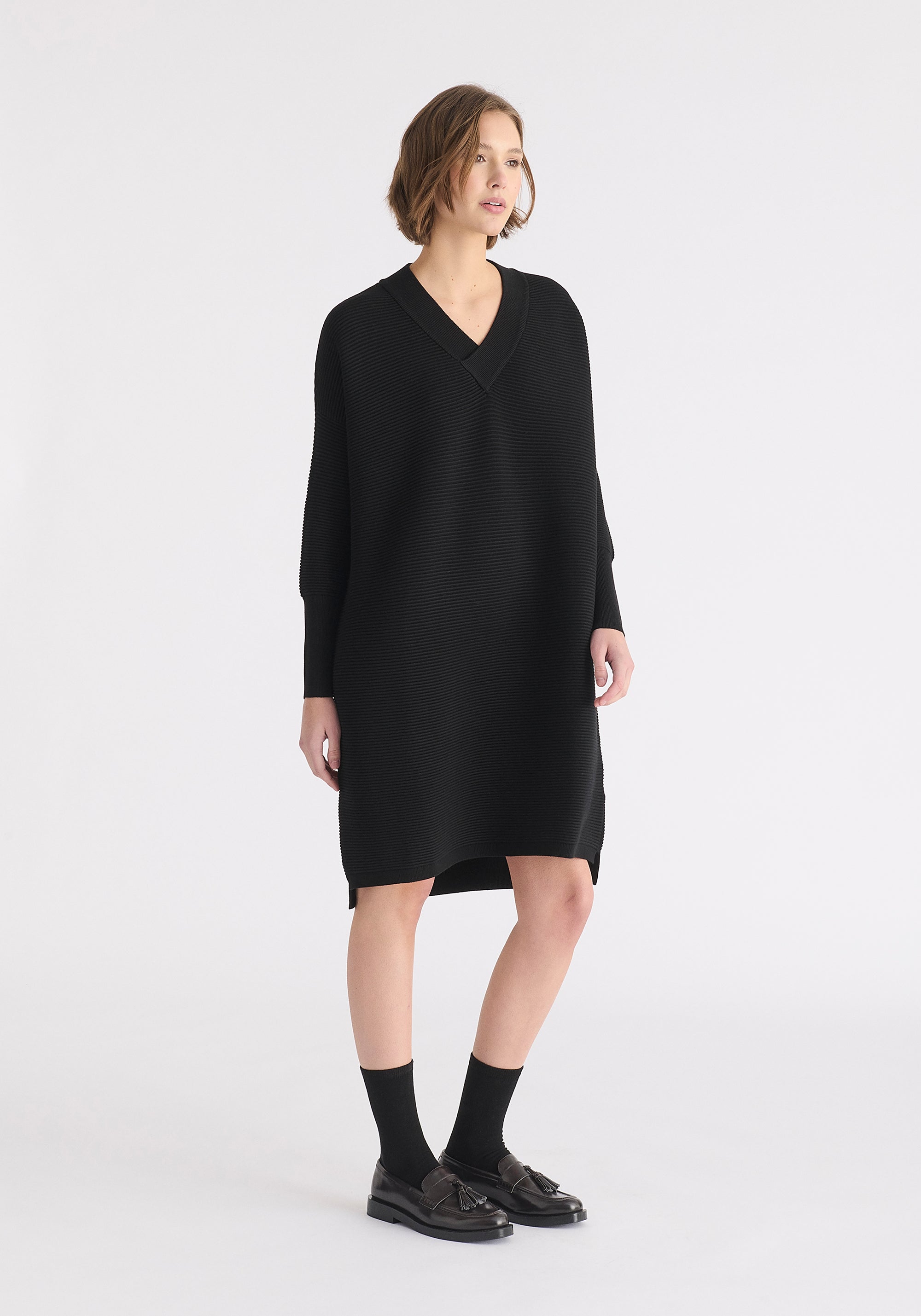 Paisie V-Neck Ribbed Jumper Dress in Black