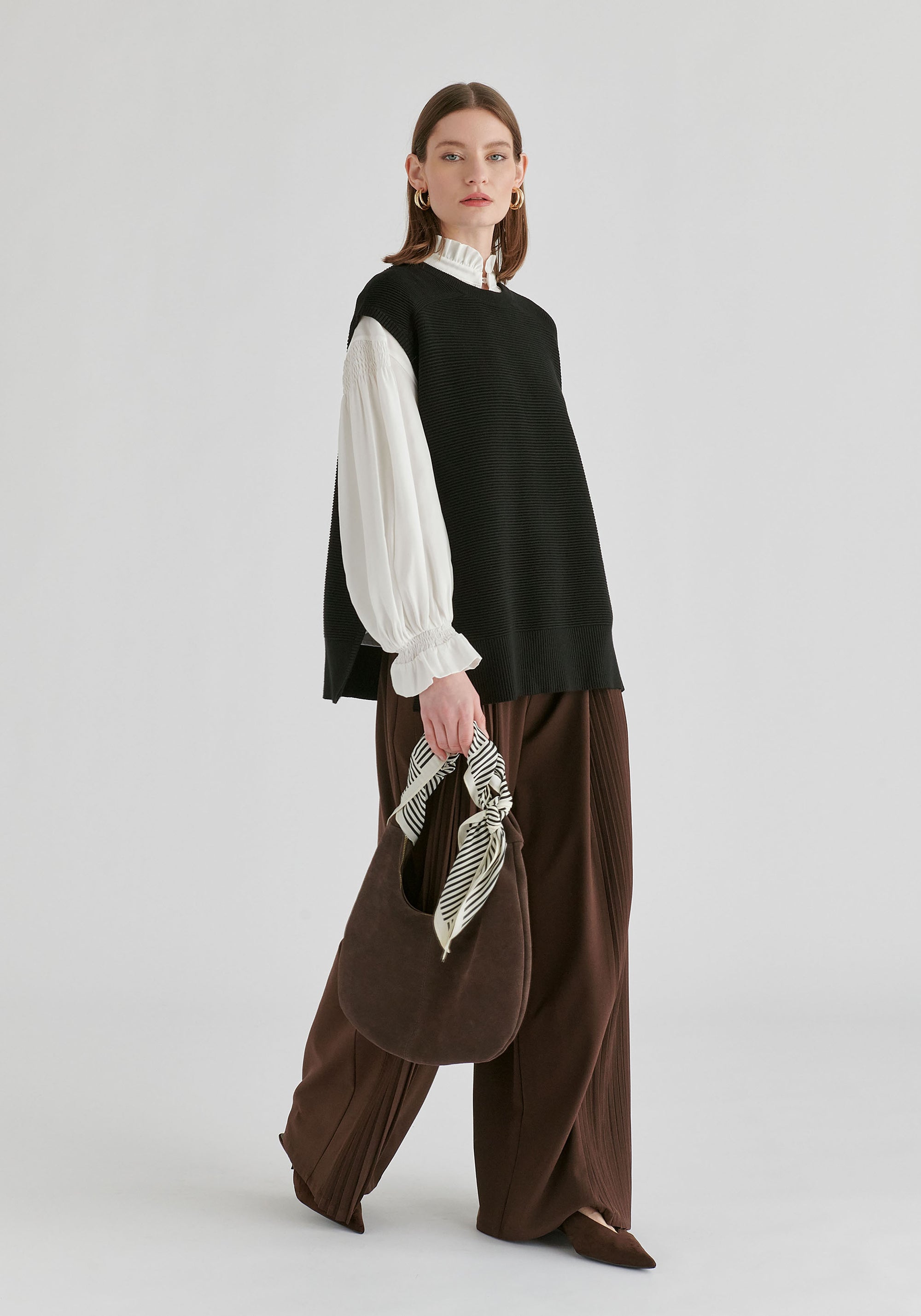 Side Slit Sleeveless Ribbed Jumper in Black Front