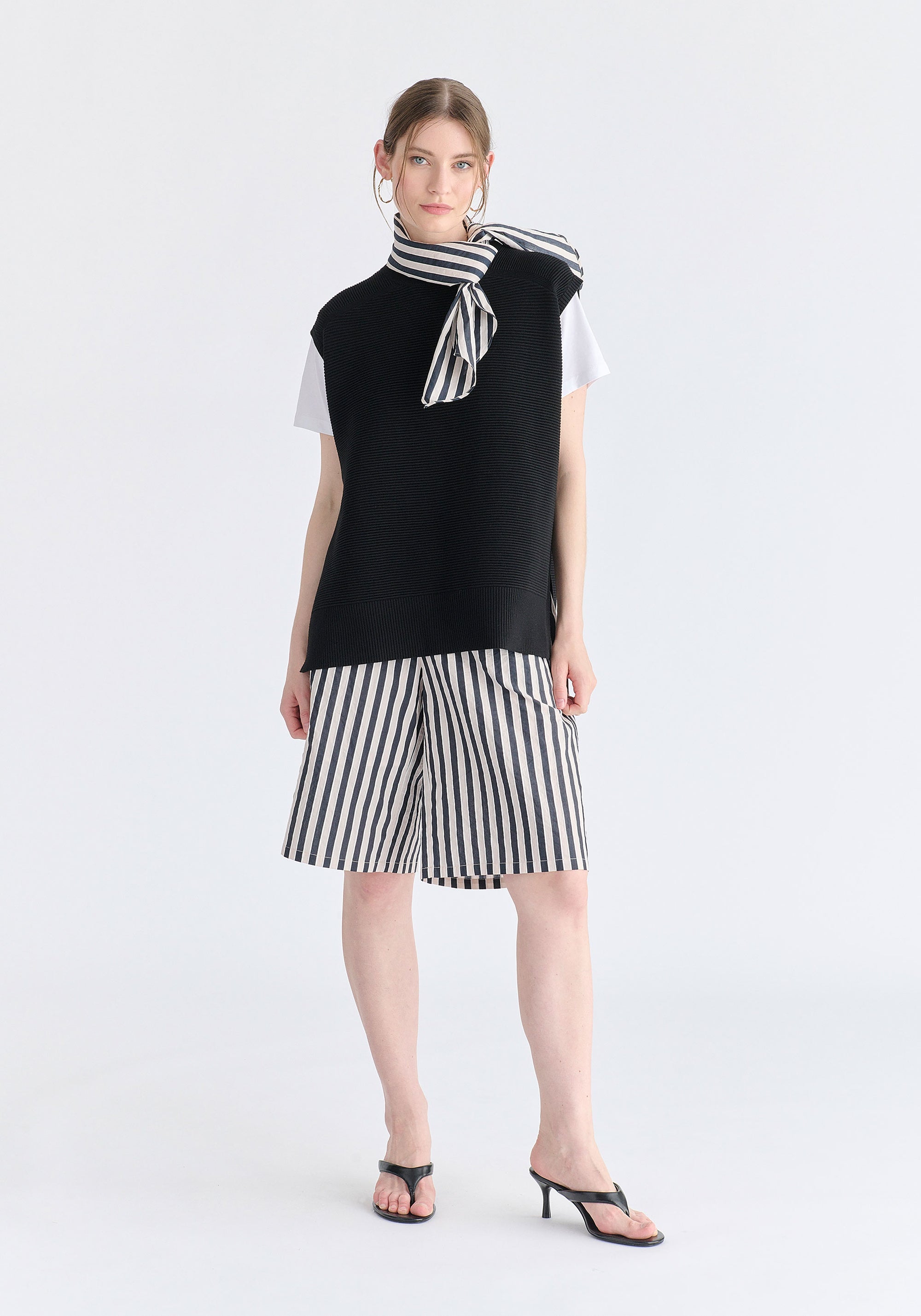 Side Slit Sleeveless Ribbed jumper in Black Front