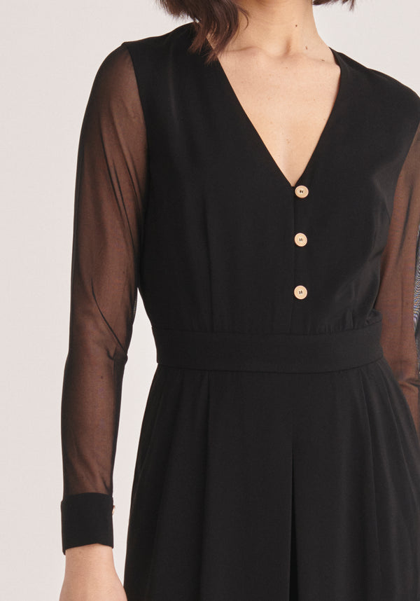 Paisie V-Neck Jumpsuit with Sheer Sleeves in Black Close Up