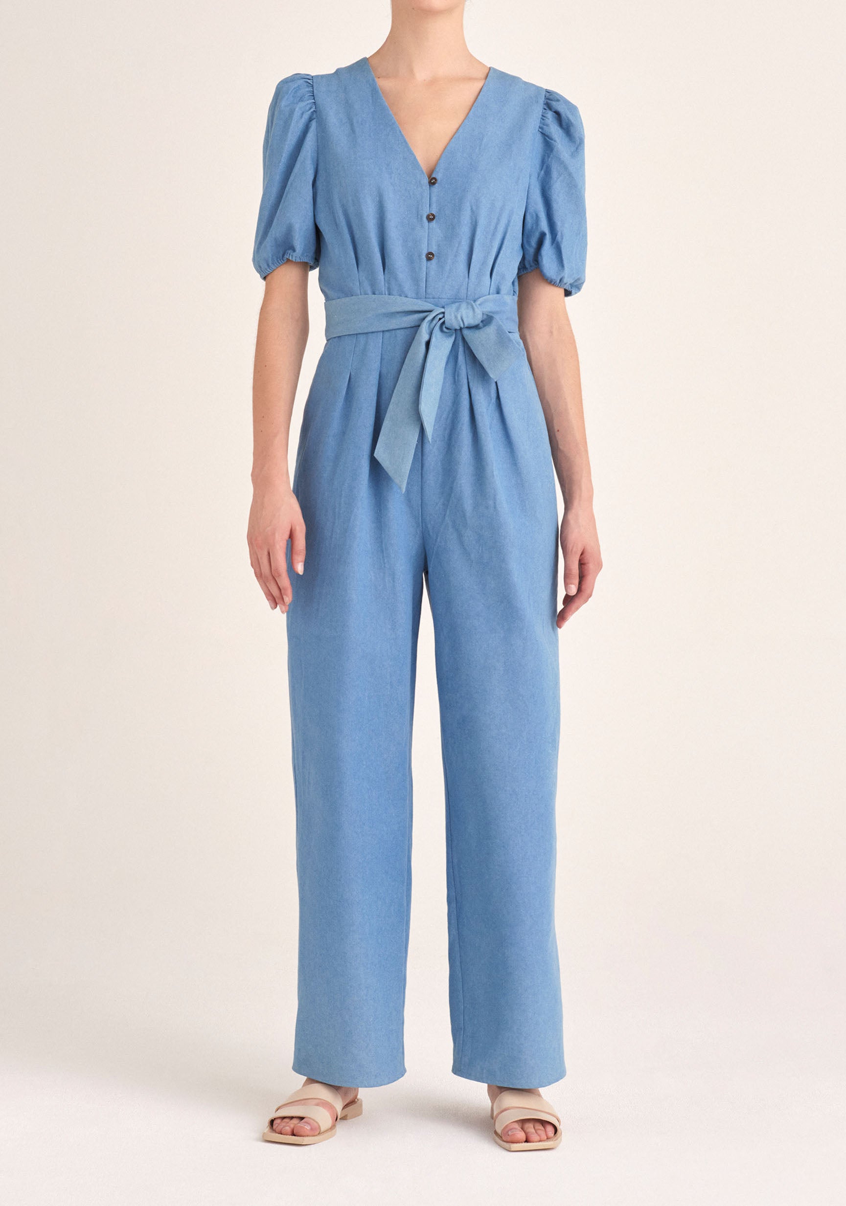 Paisie Puff Sleeve Denim Jumpsuit with Belt in Light Blue