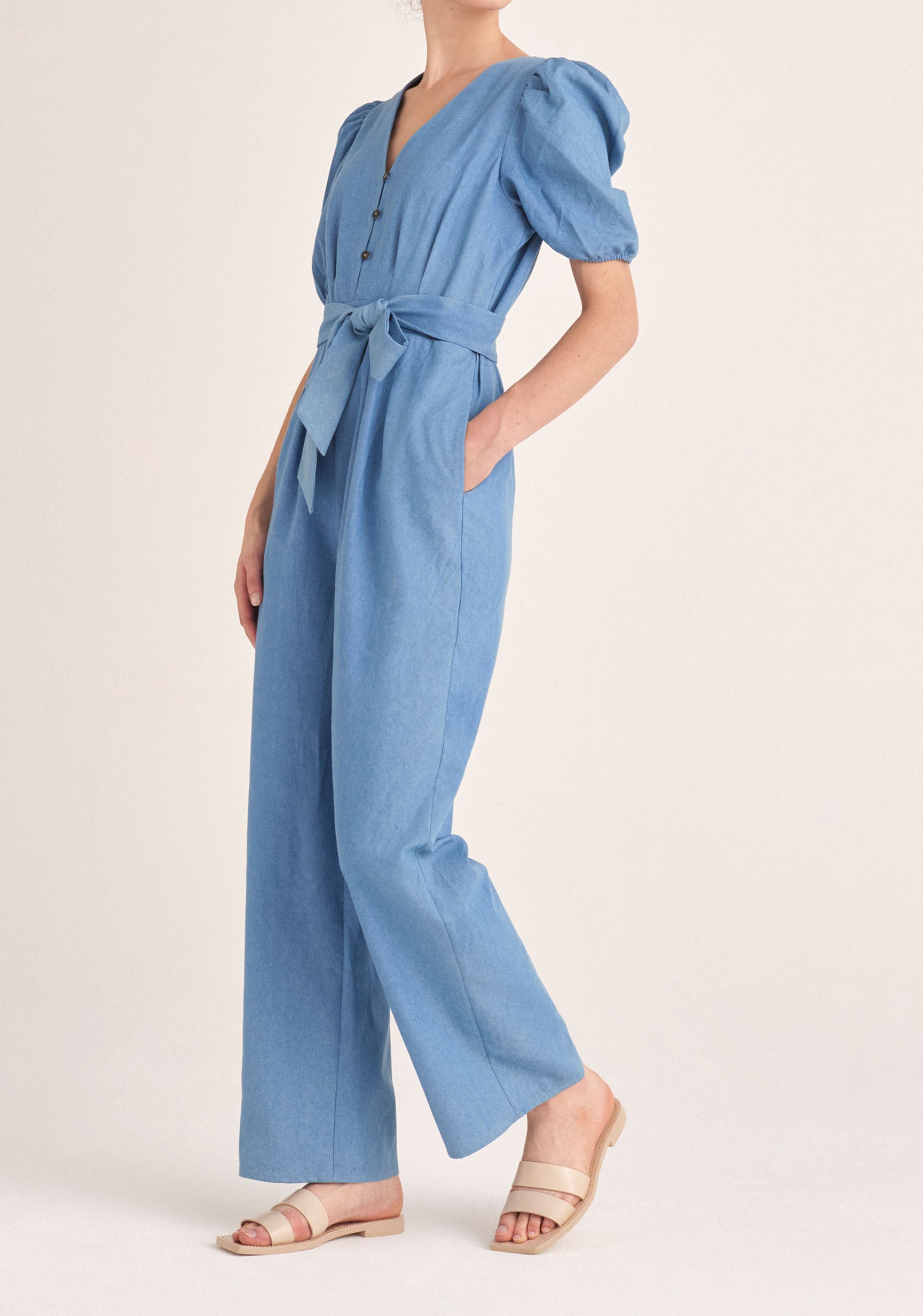 Paisie Puff Sleeve Denim Jumpsuit with Belt in Light Blue