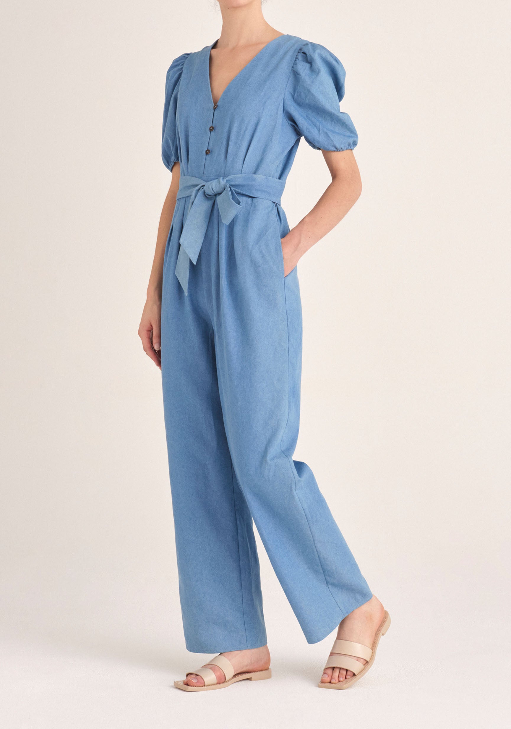 Paisie Puff Sleeve Denim Jumpsuit with Belt in Light Blue