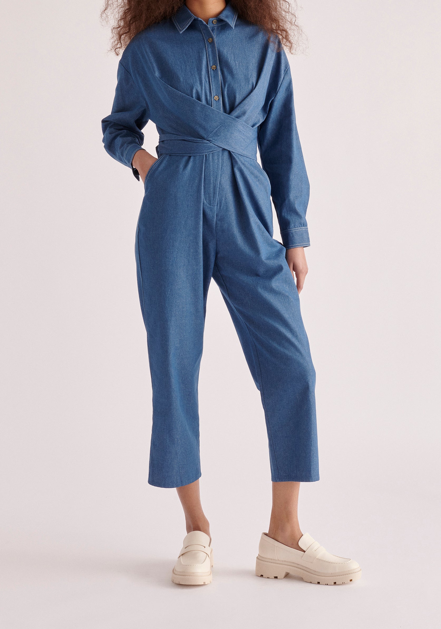 Paisie Waist Tie Denim Jumpsuit in Light Blue