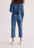 Paisie Waist Tie Denim Jumpsuit in Light Blue Back