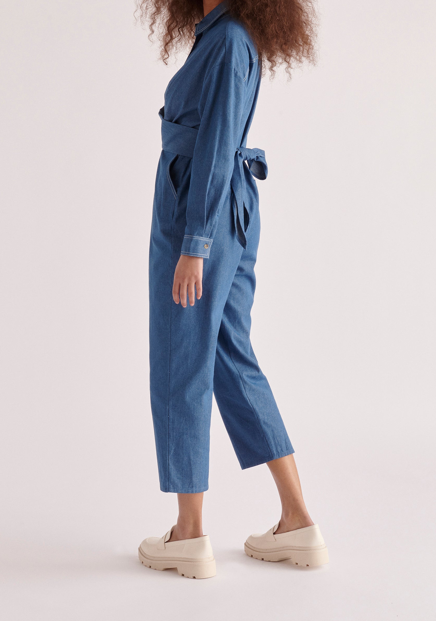 Paisie Waist Tie Denim Jumpsuit in Light Blue Side
