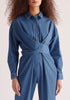 Paisie Waist Tie Denim Jumpsuit in Light Blue Close Up