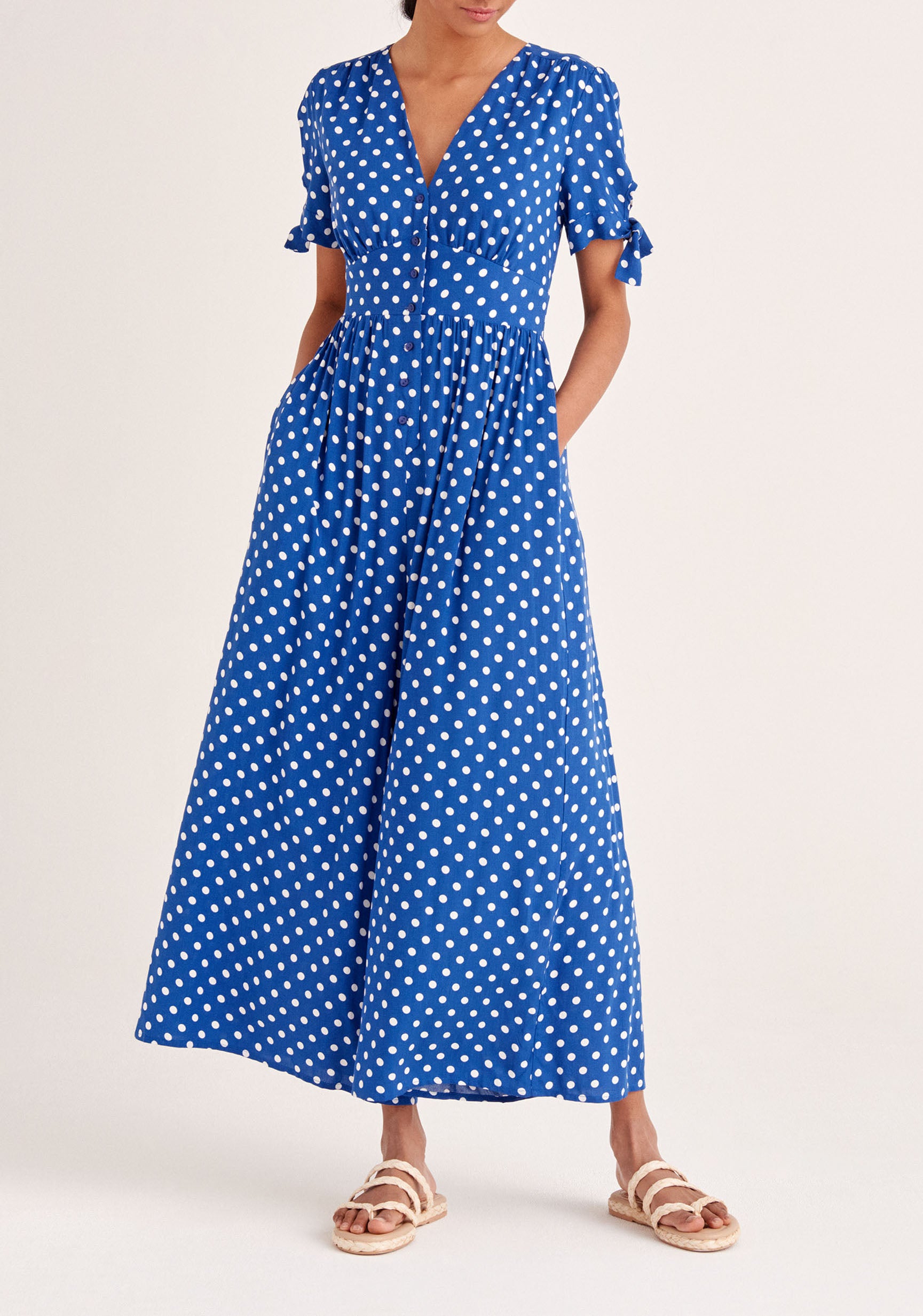 Paisie Sleeve Tie Polka Dot Jumpsuit in Dark Blue and White