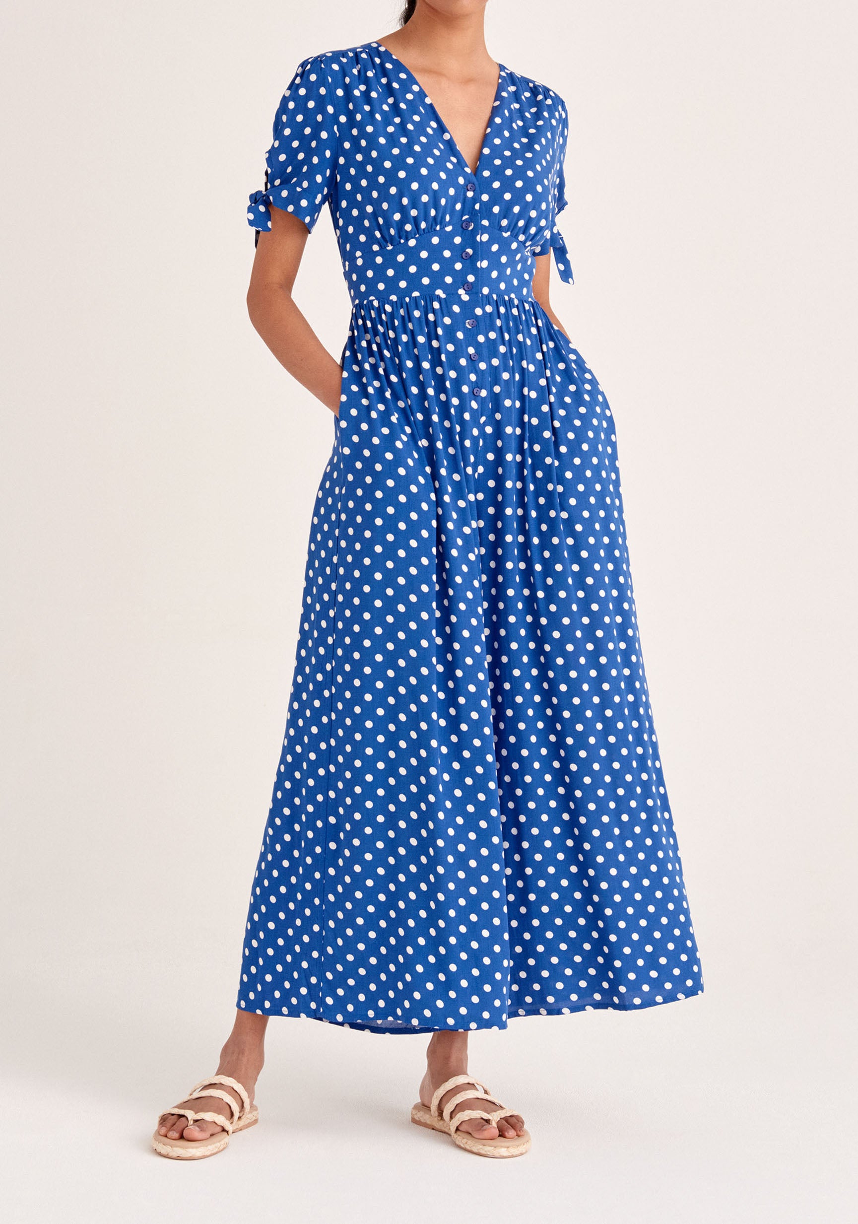 Paisie Sleeve Tie Polka Dot Jumpsuit in Dark Blue and White
