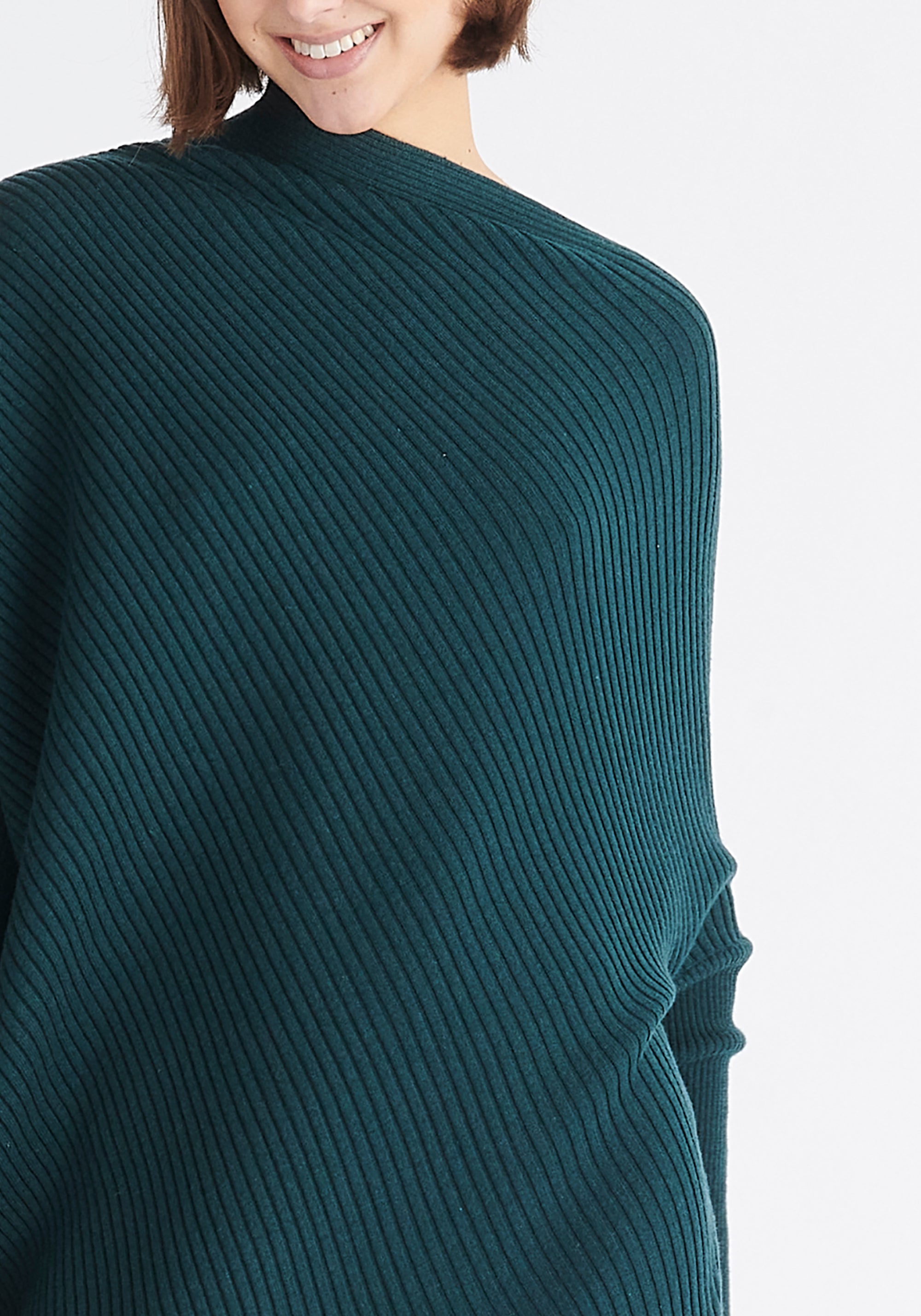 Paisie Draped Jumper Dress in Dark Green Close Up