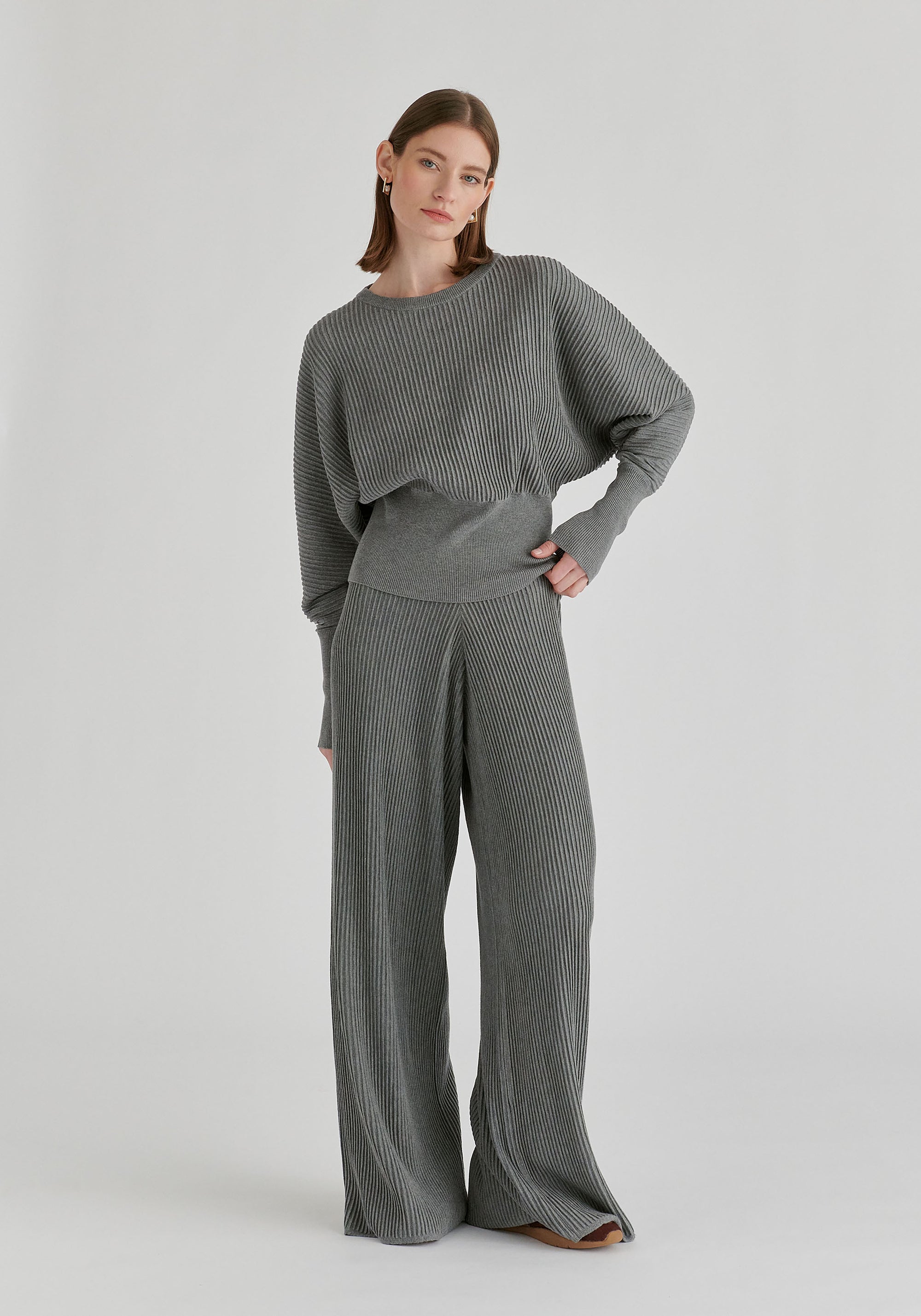 Ribbed Batwing Sleeve Knit Top with Fitted Waist